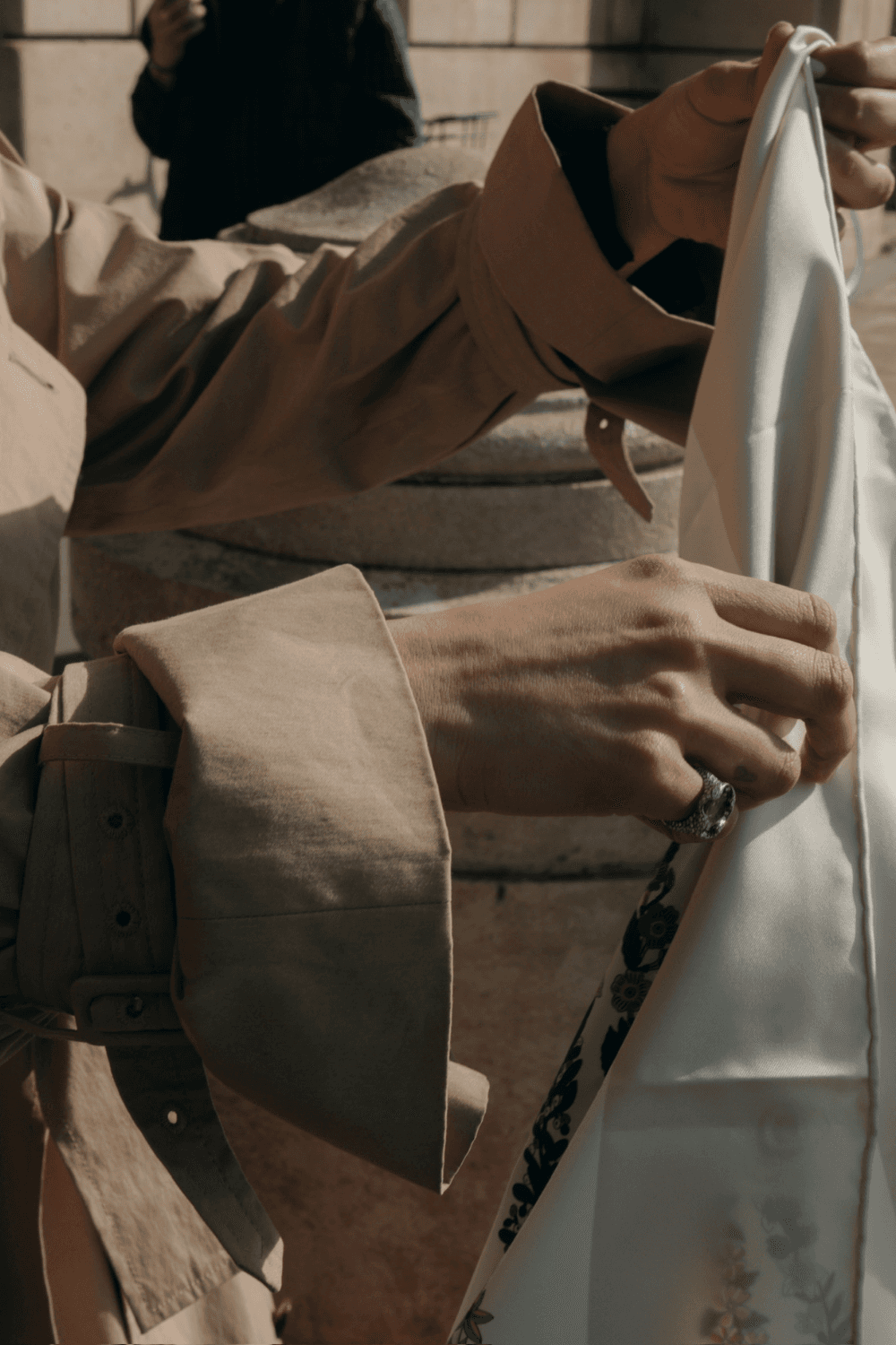 Cozy, dimly lit pub scene with a round wooden table, empty beer bottles, and glasses under a stained glass lamp. A deer head decorates the wall.