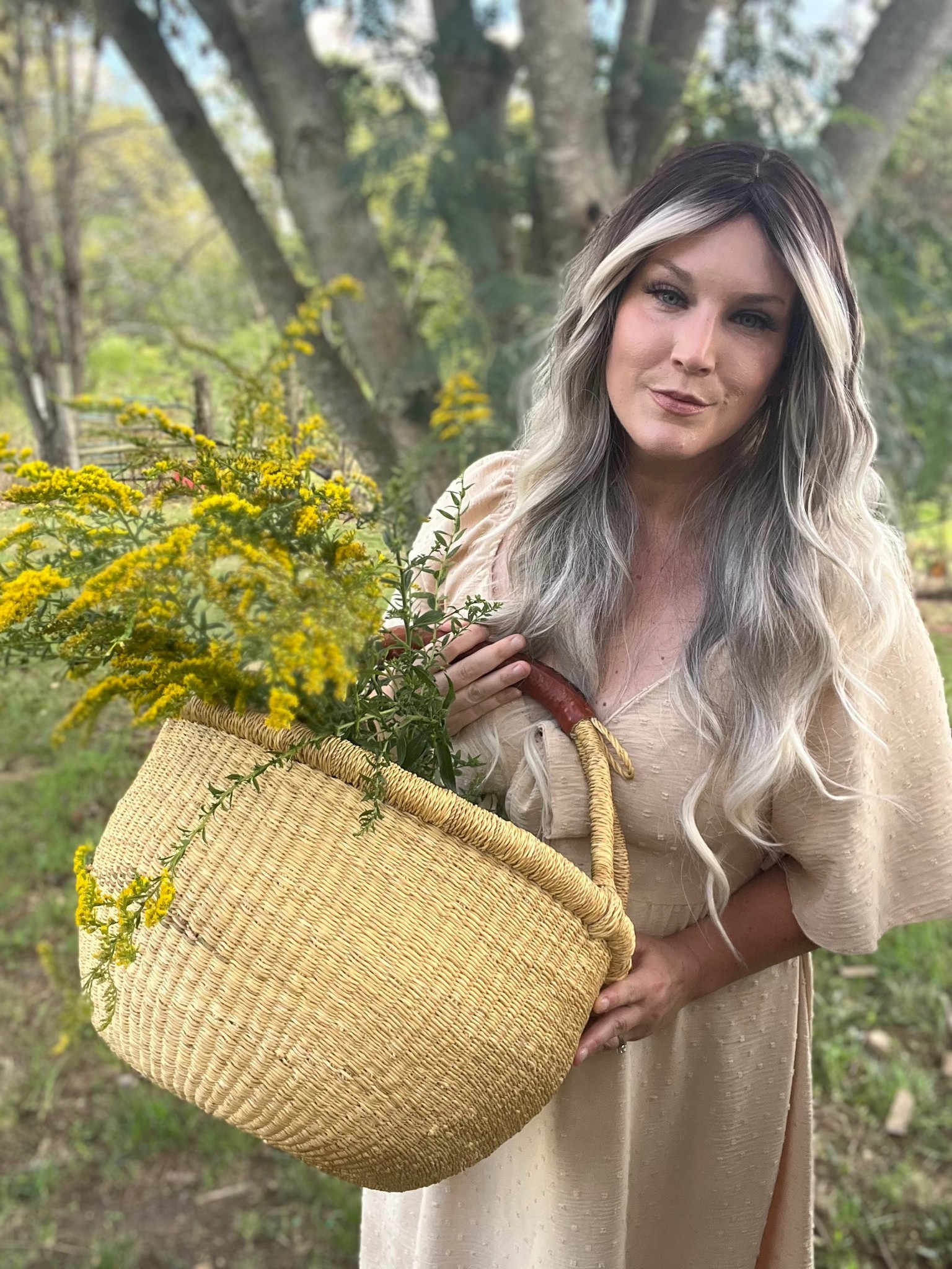 Amber Robinson Registered Herbalist in green field