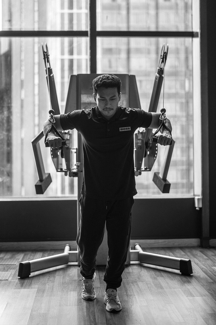 Man Using A Cable Machine
