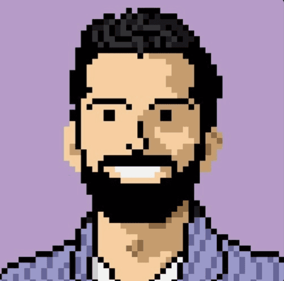Pixel art portrait of a smiling man with dark hair and a beard, wearing a striped shirt. The background is purple, conveying a playful tone.
