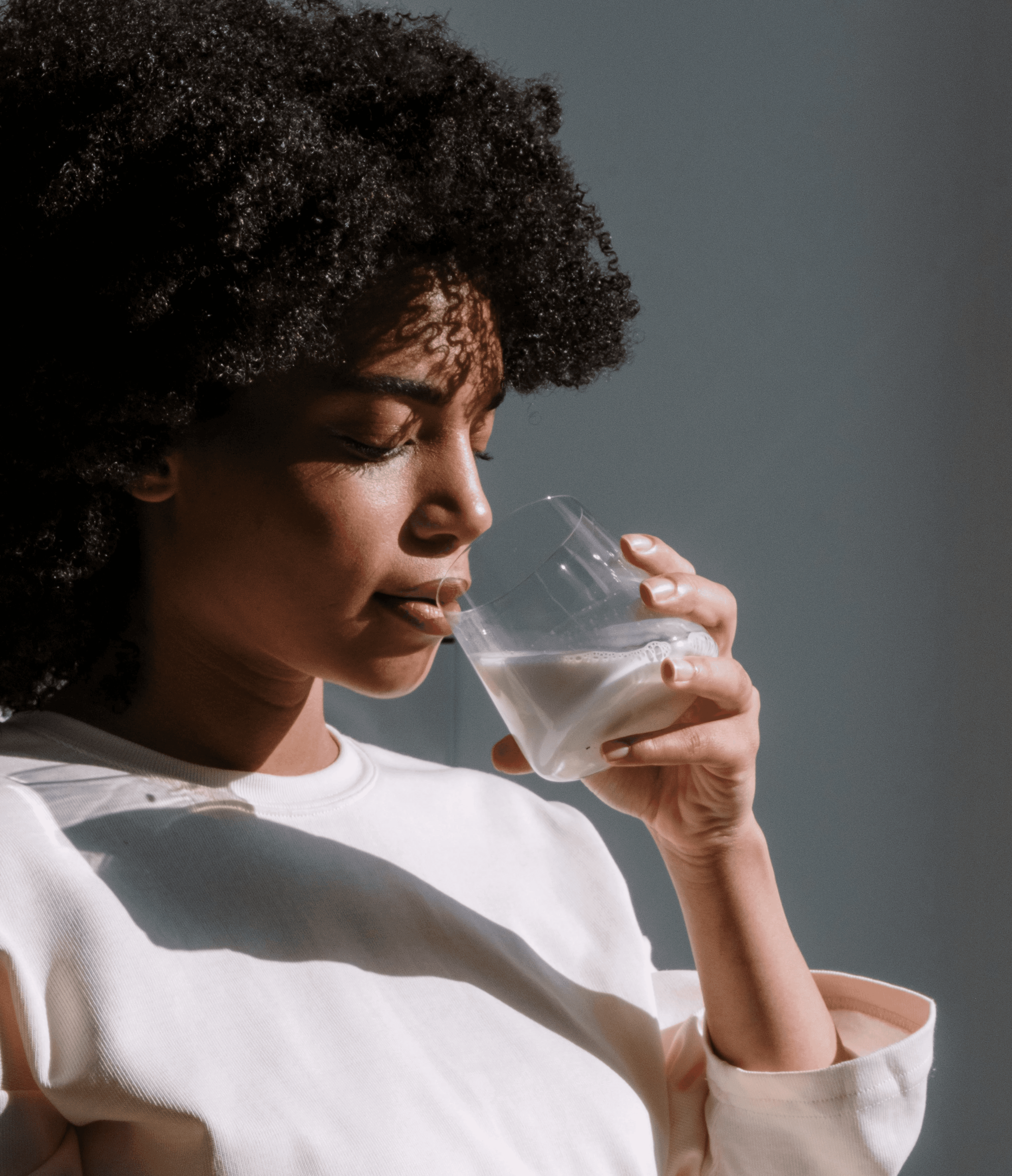 Man receiving Botox injection near the temple area as part of a migraine relief treatment designed to reduce chronic headache frequency and intensity.