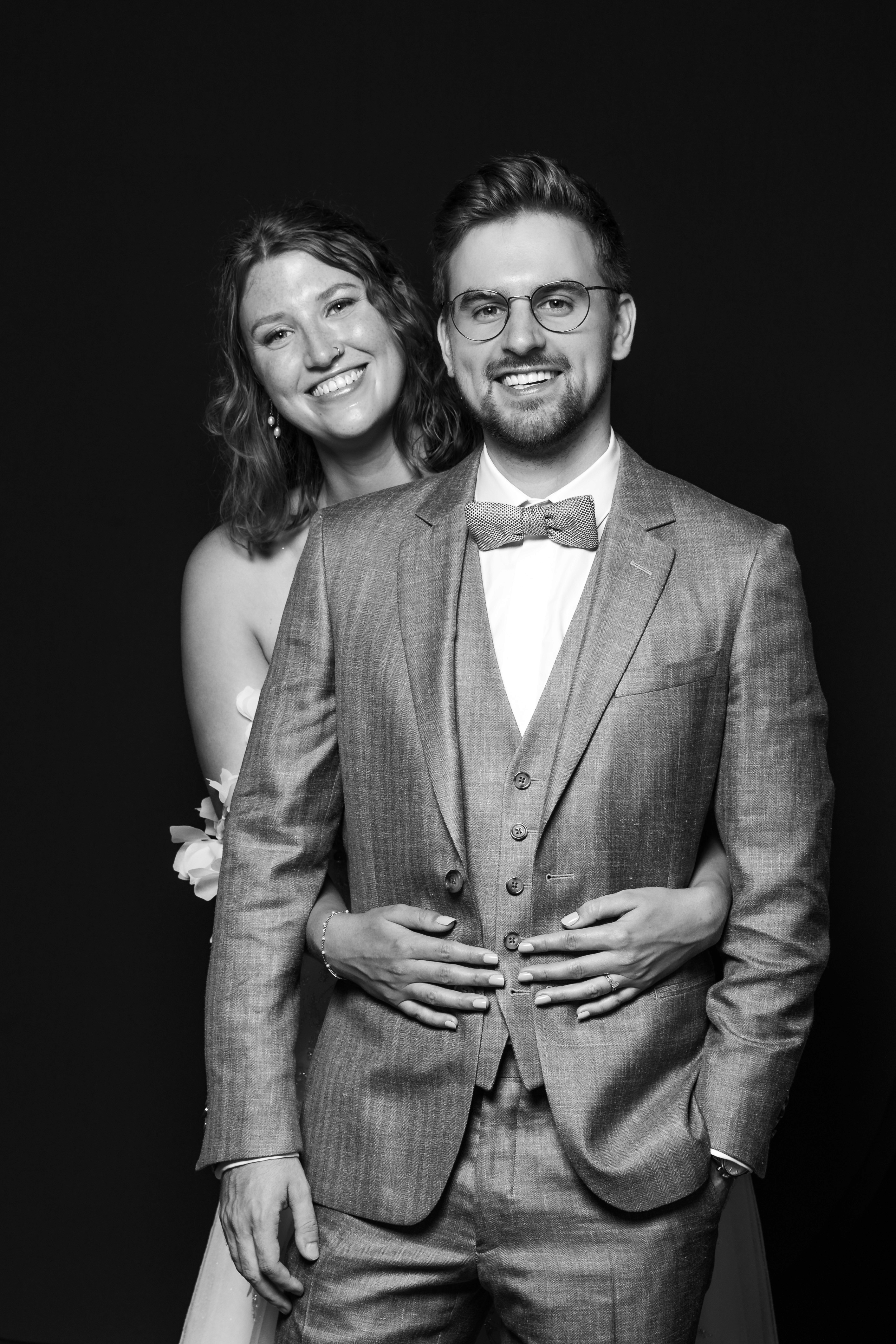 Black and white photo of man posing on camera