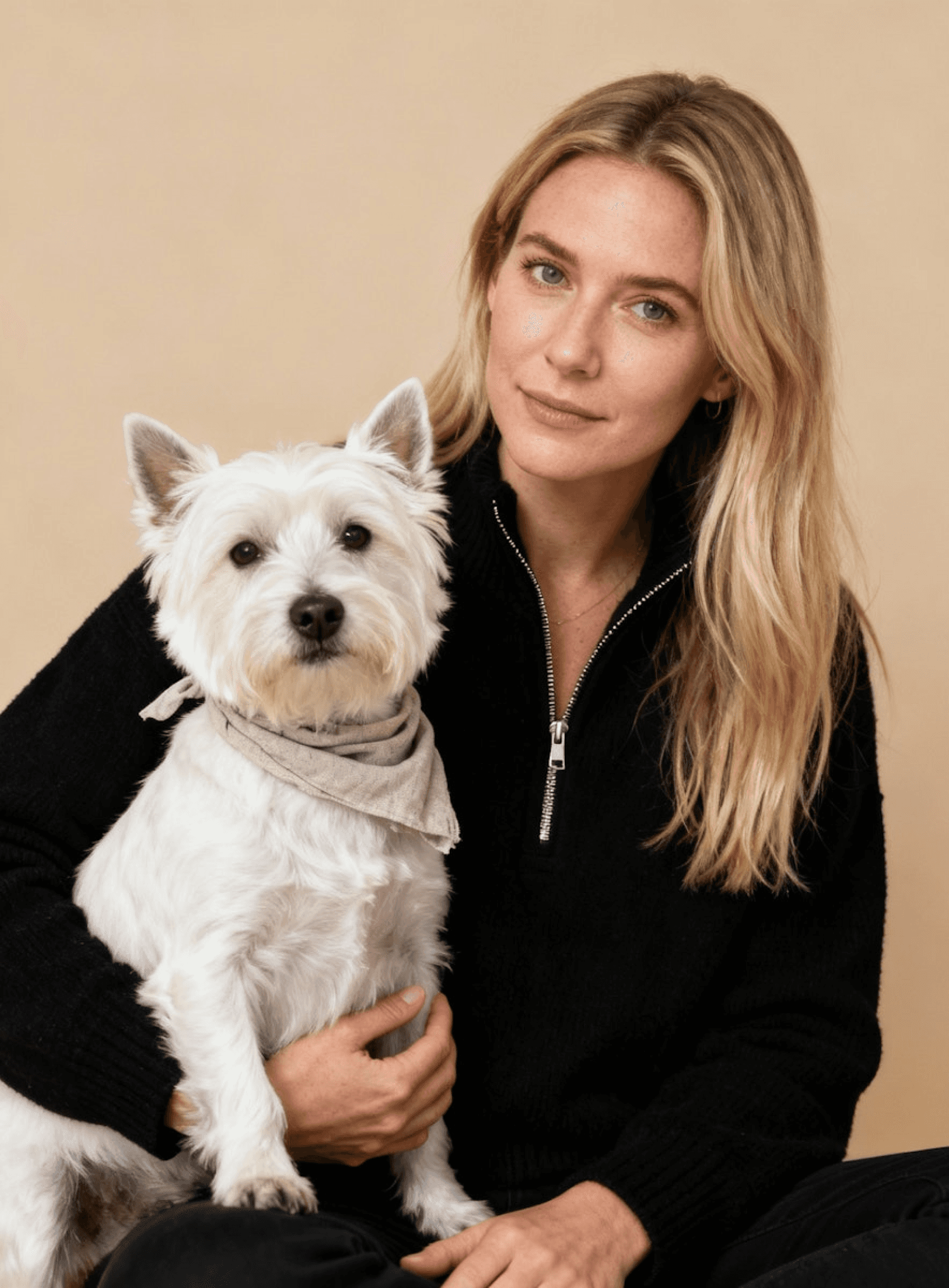 portrait shot of a puppy and its owner