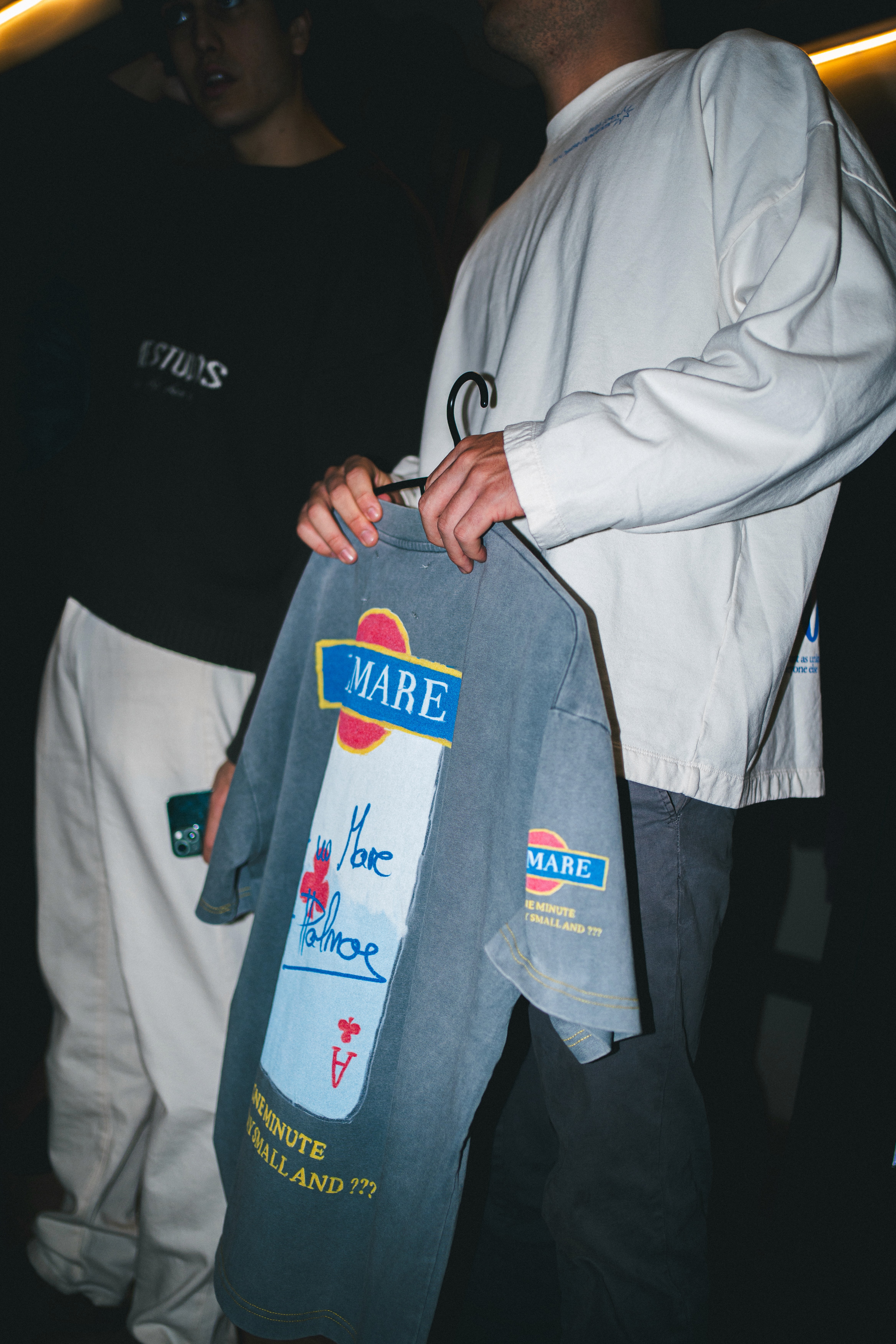 A woman with a head made of mirrors, reflecting light and creating a kaleidoscopic effect around her.