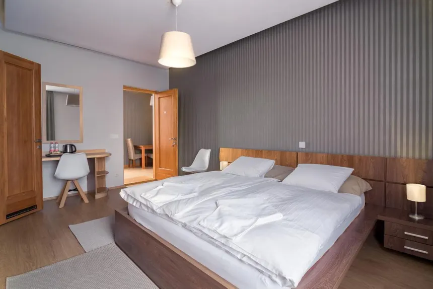 A bright yoga studio with a girl practicing gentle restorative yoga.