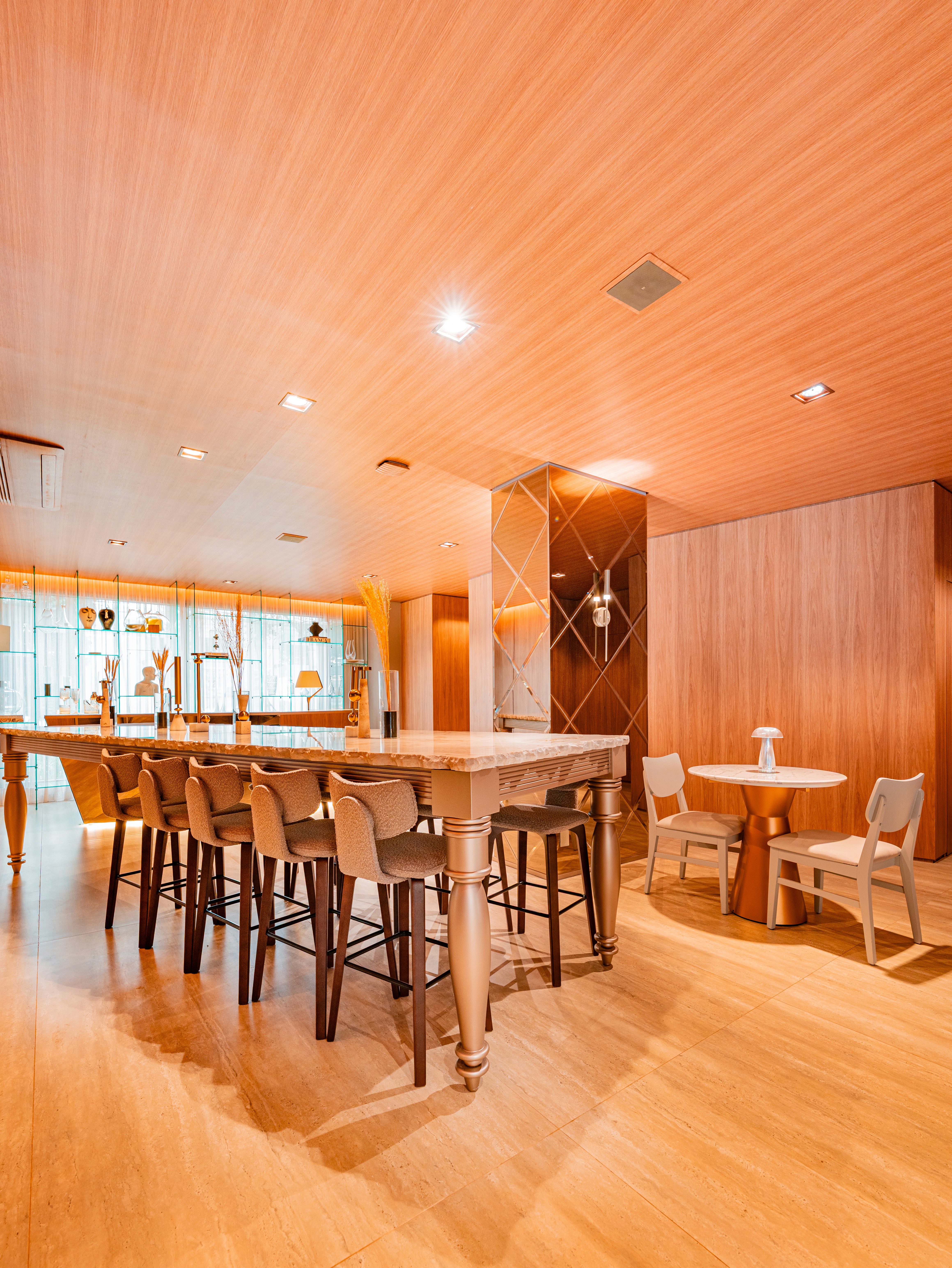 Curved modern skyscraper against a clear blue sky.