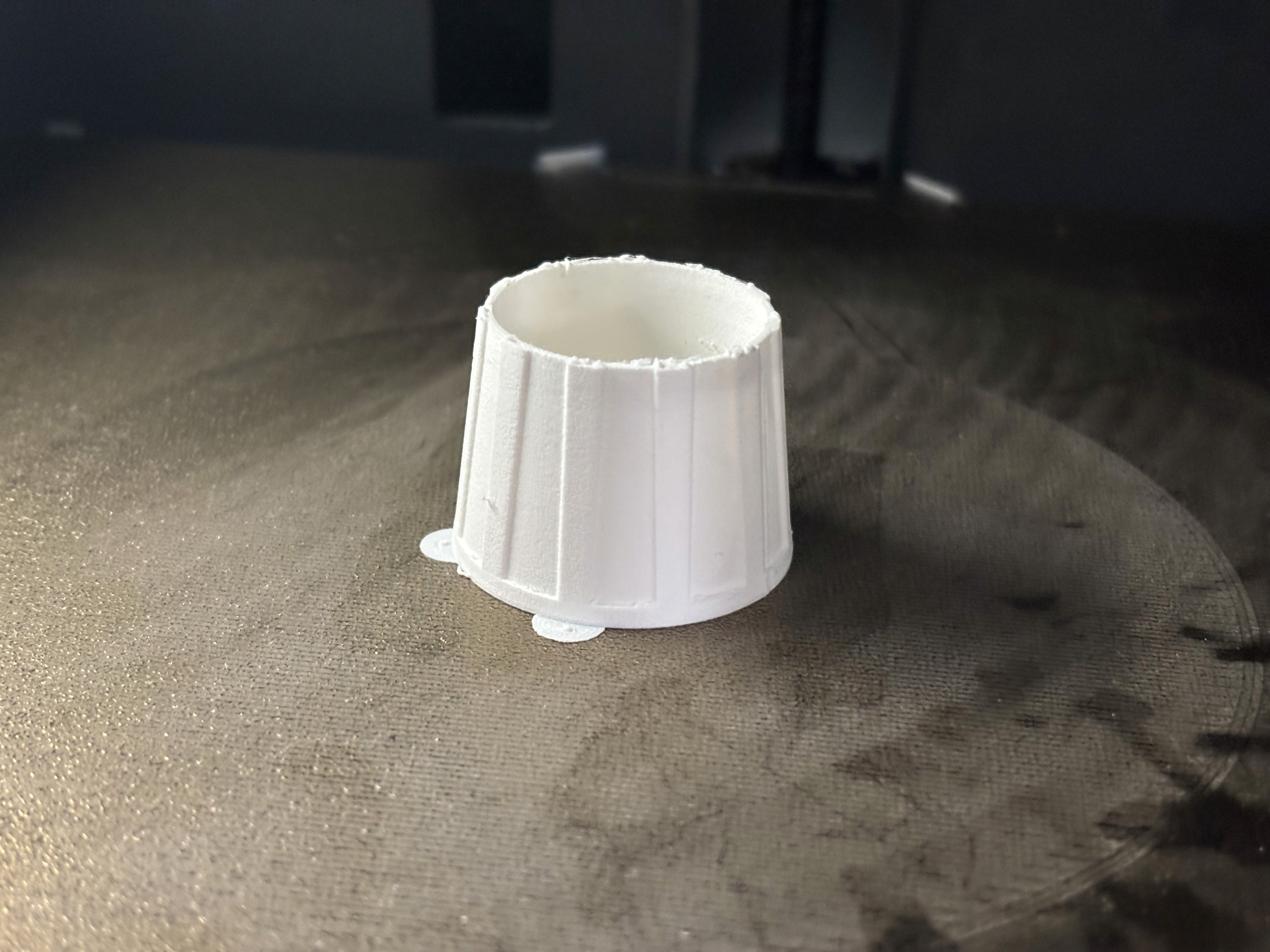 Printed nozzle on scale showing target weight