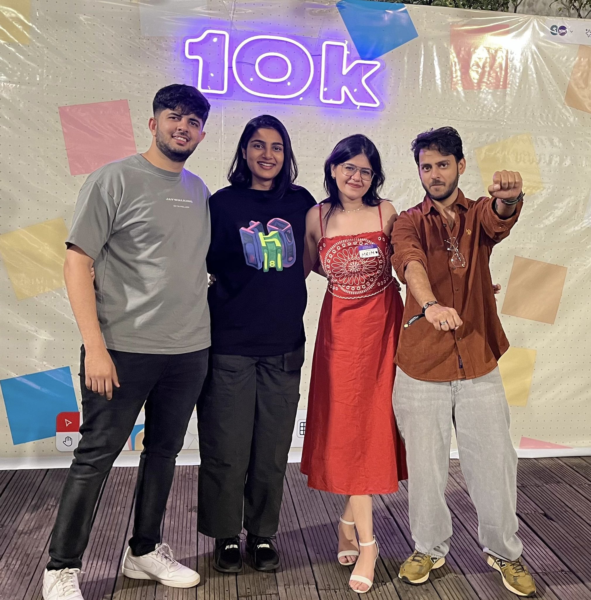 a japanese style building with a japanese roof and trees around it