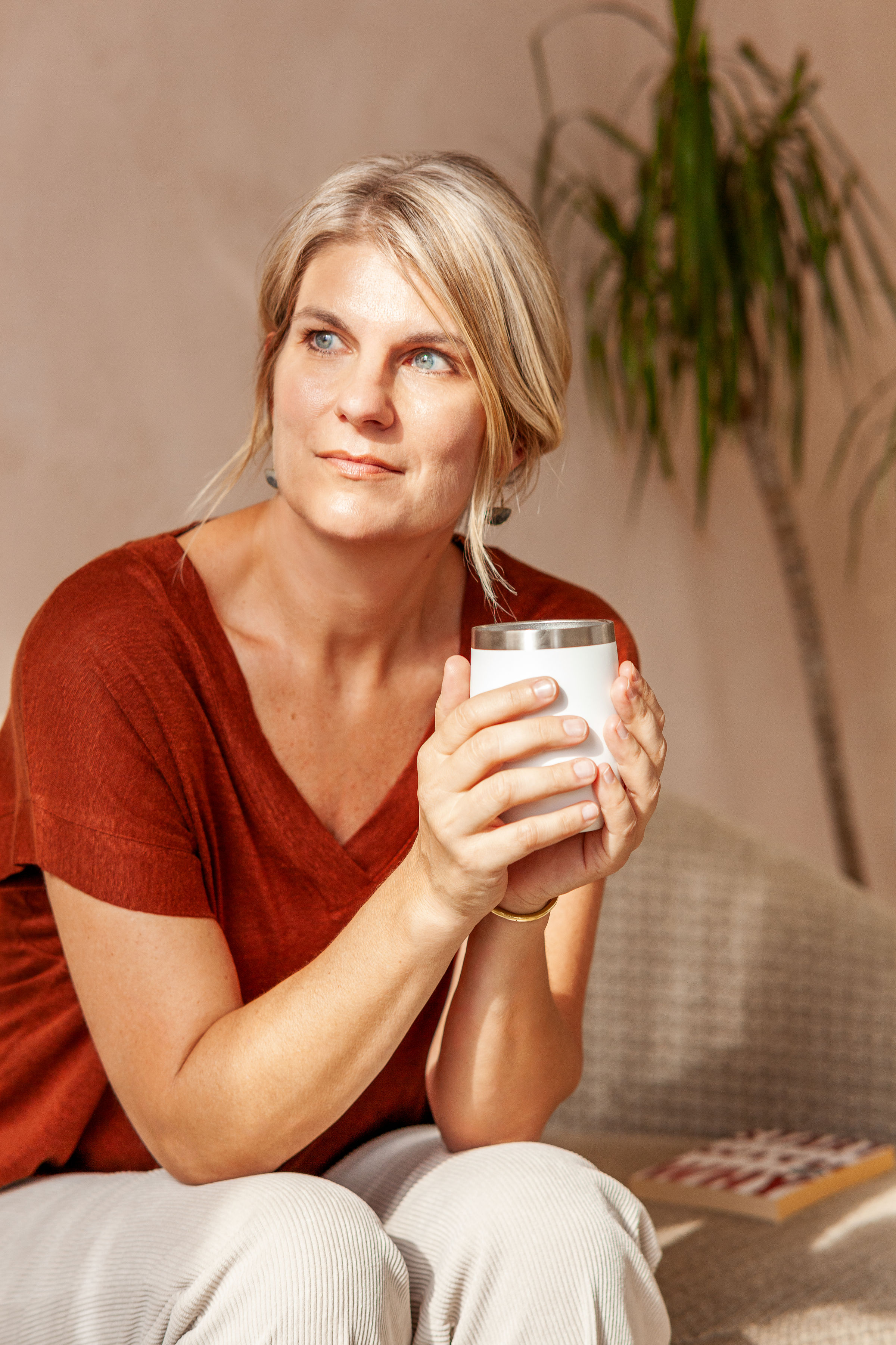 woman holding a coffee