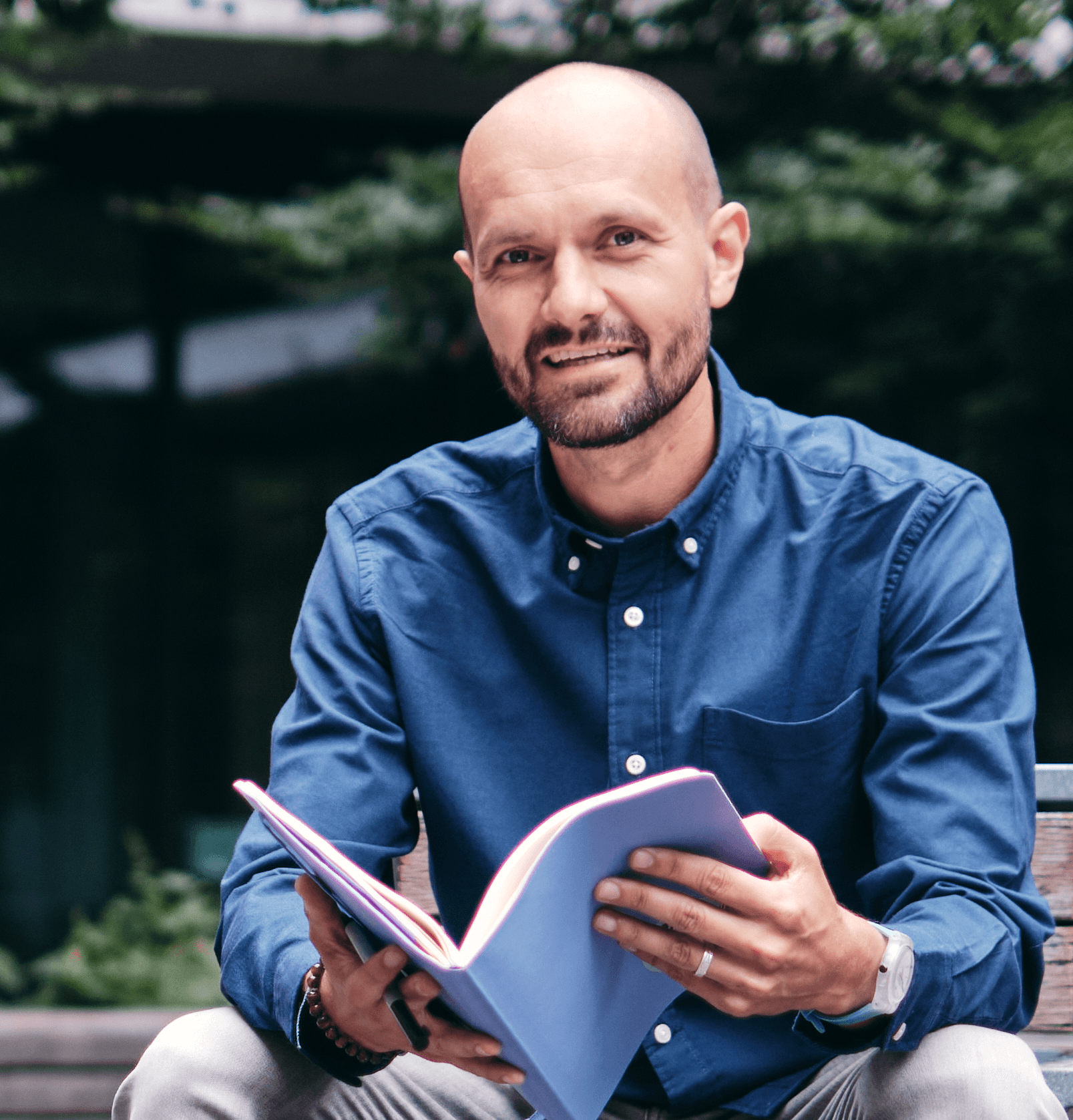 person sitting in a chair in front of a man