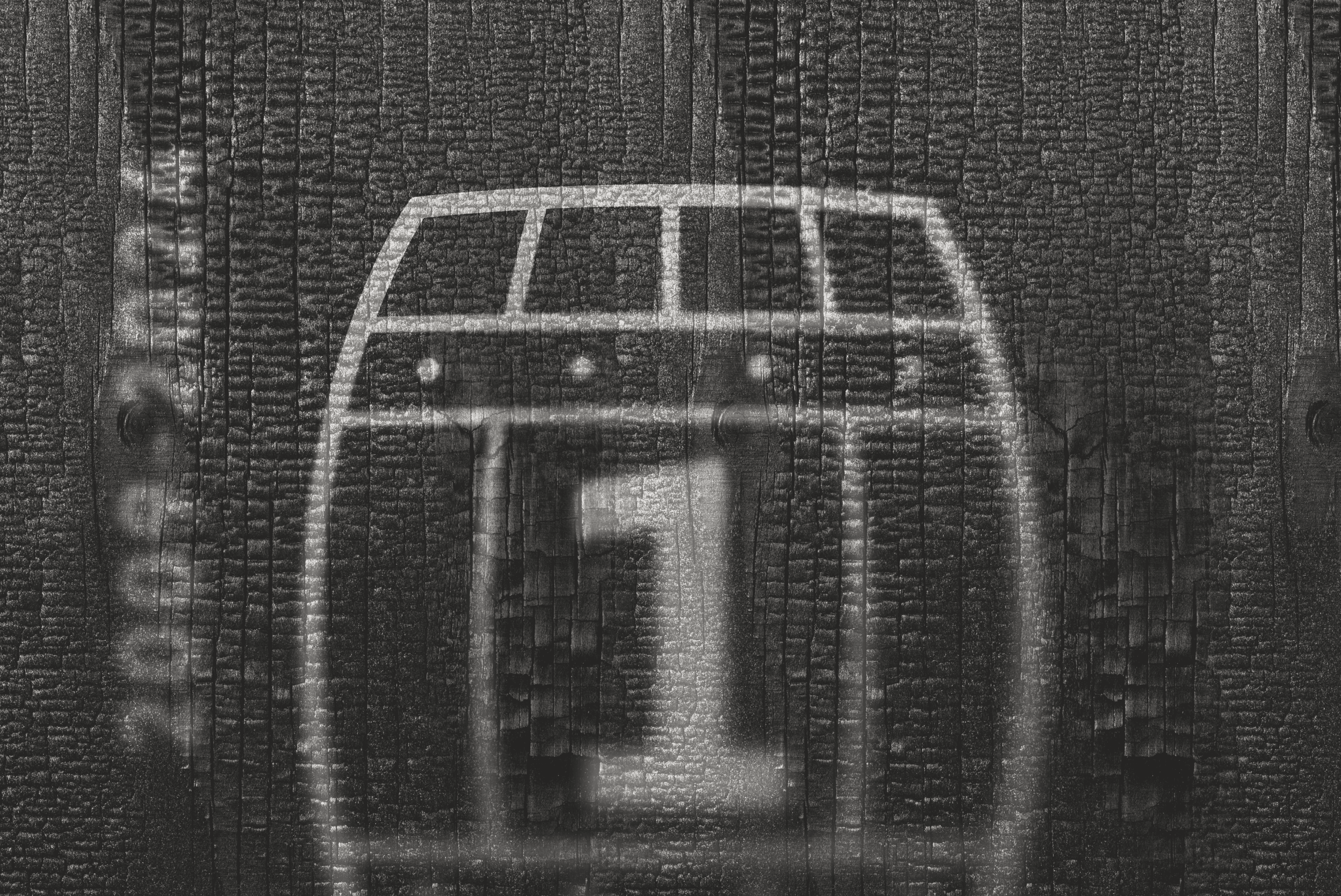 Burnt wood texture overlayed with spray-painted number 1 symbol.