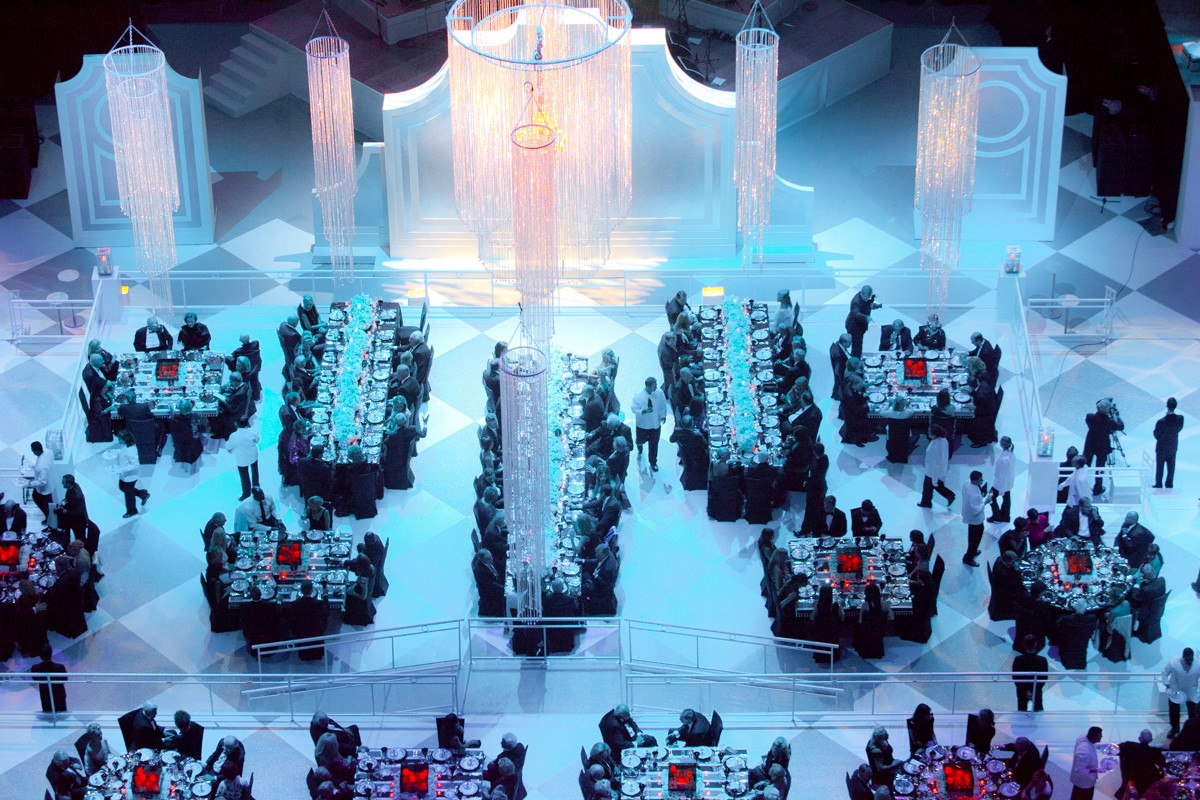 overhead photo of the table and staging arrangements for the landmark celebration dinner at ATT Stadium