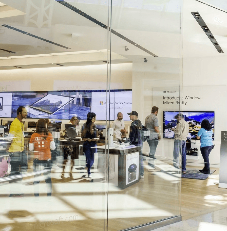 Microsoft store windowfront with customers inside