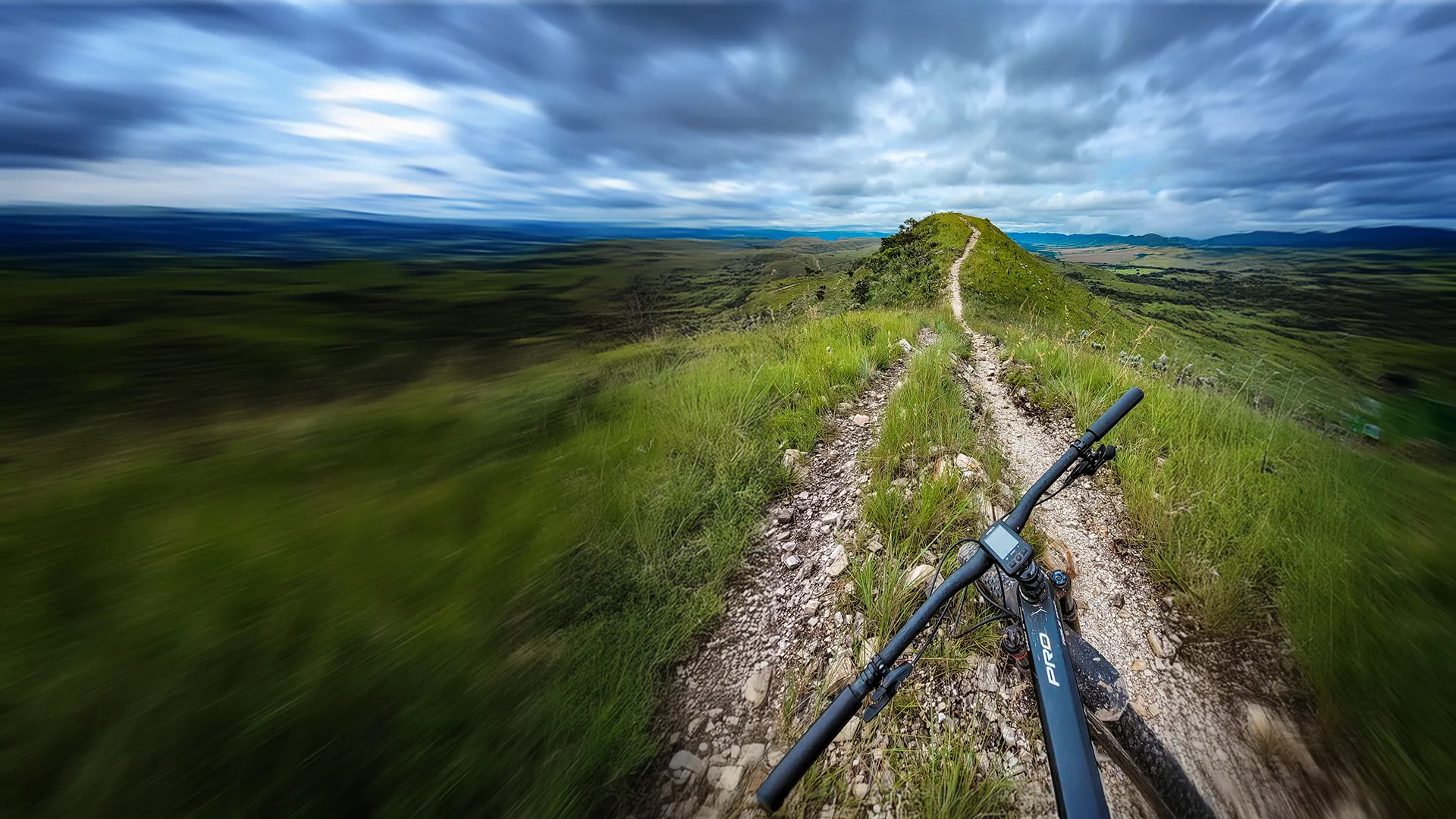 Dynamic picture of a cyclist riding downhill
