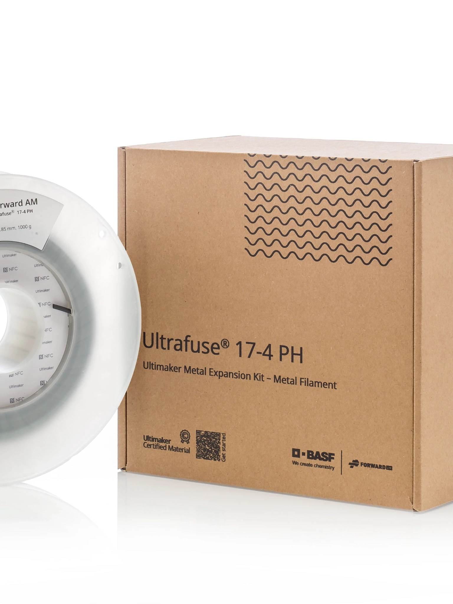 Modern home office setup with a monitor, ergonomic chair, keyboard, and indoor plants near a window with blinds.