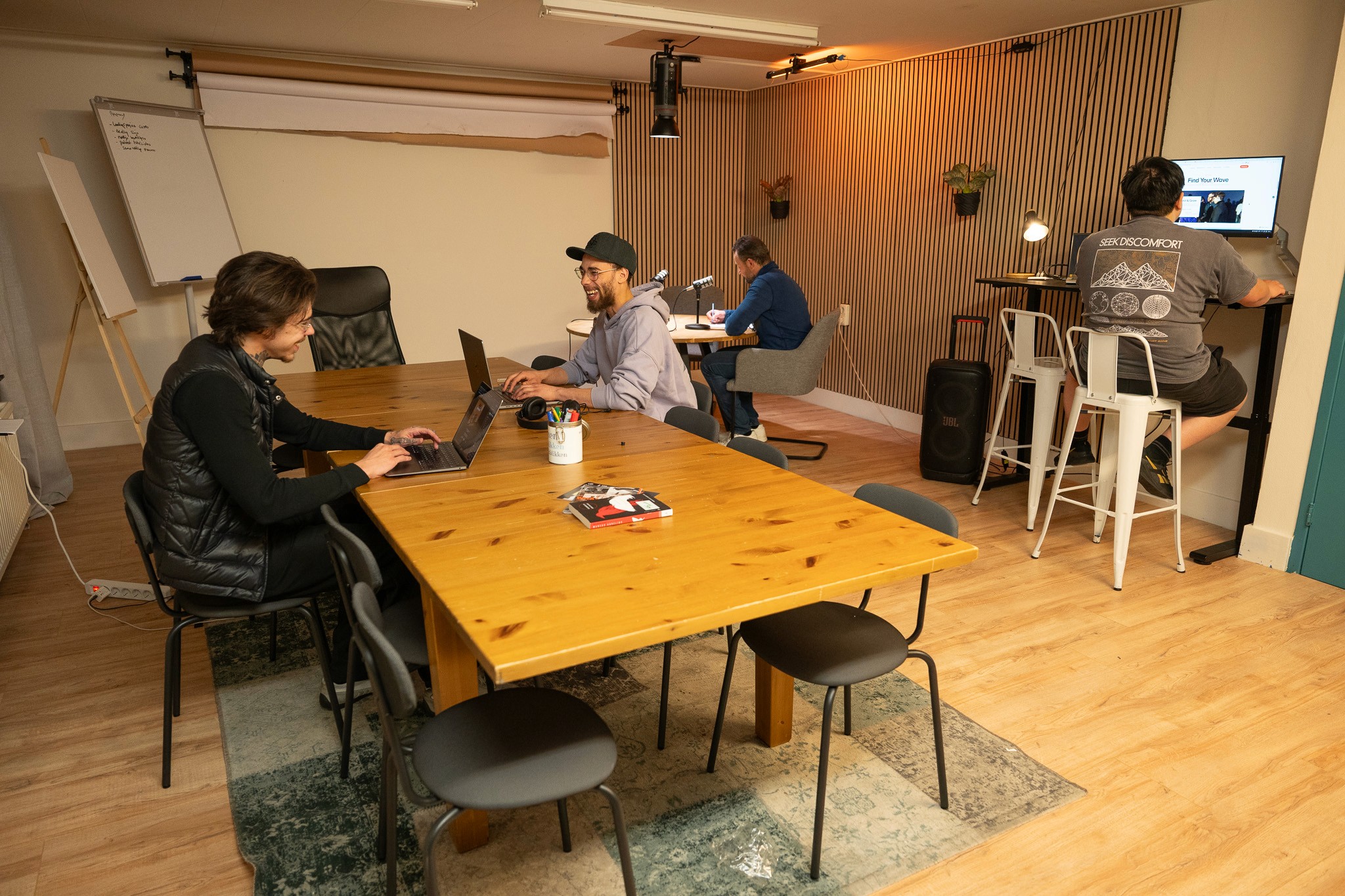 A man standing with Sufboard