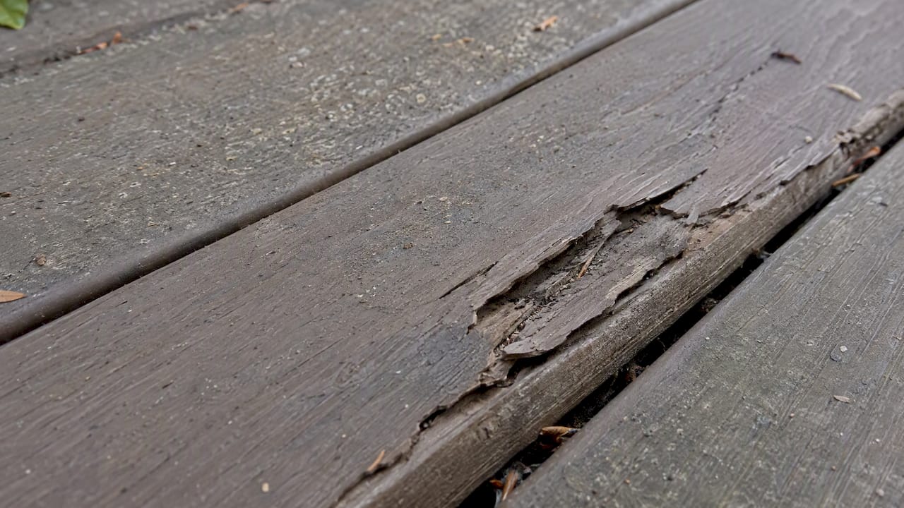Cracking and flaking on a composite deck board