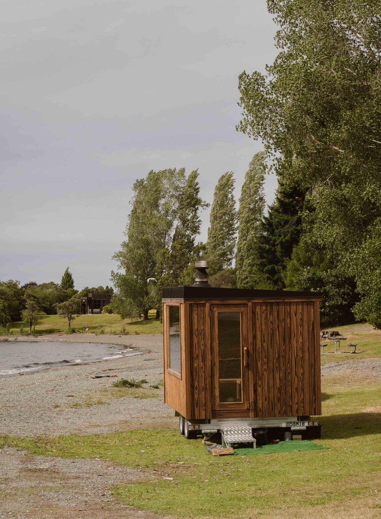 Mobile sauna parked up next to a lake