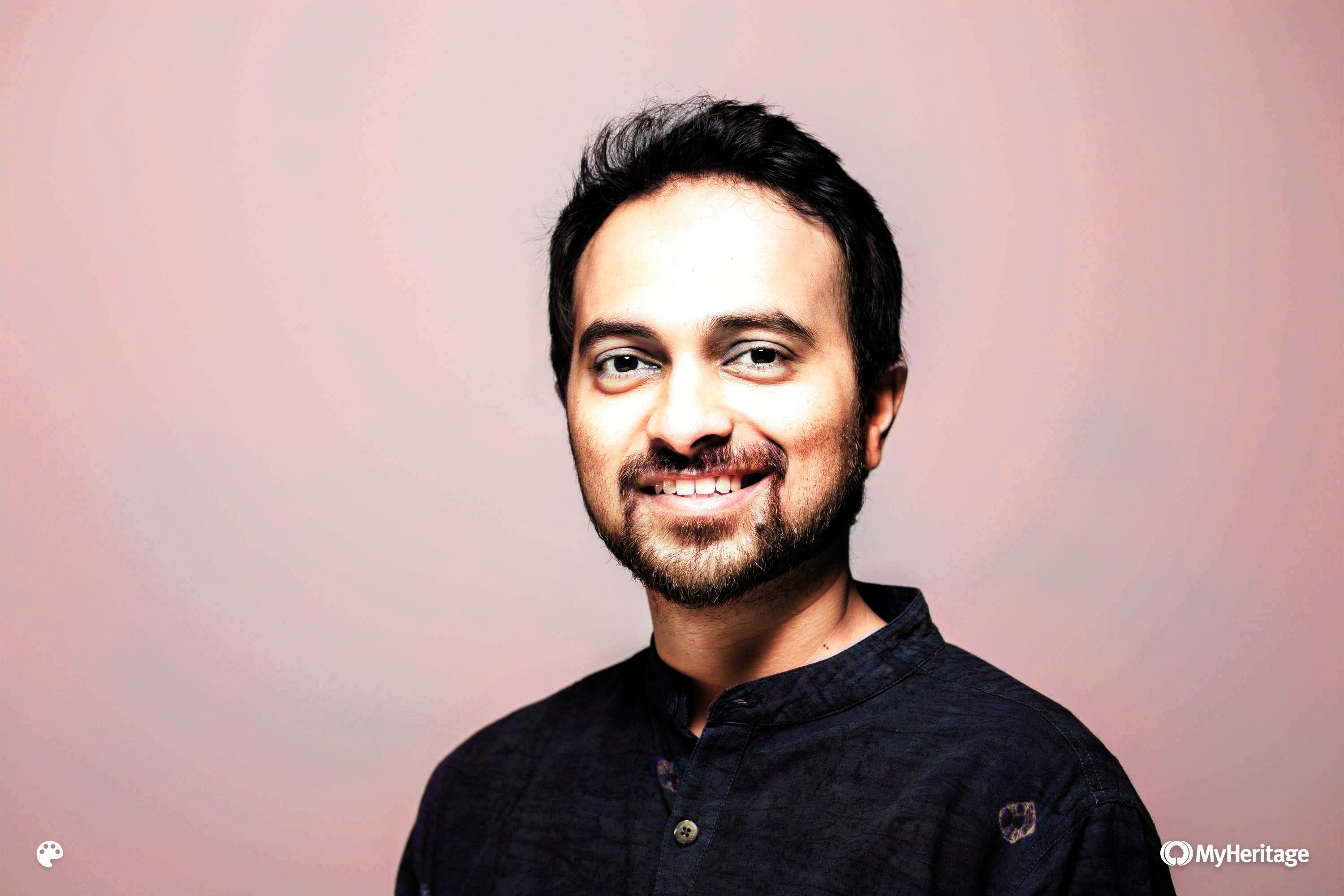 A photo of a man looking at the camera