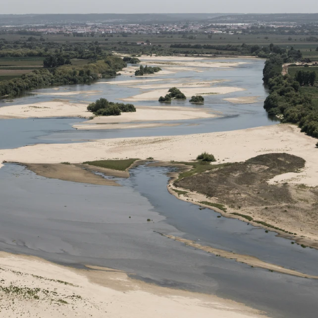 an aerial view of a lush green valley
