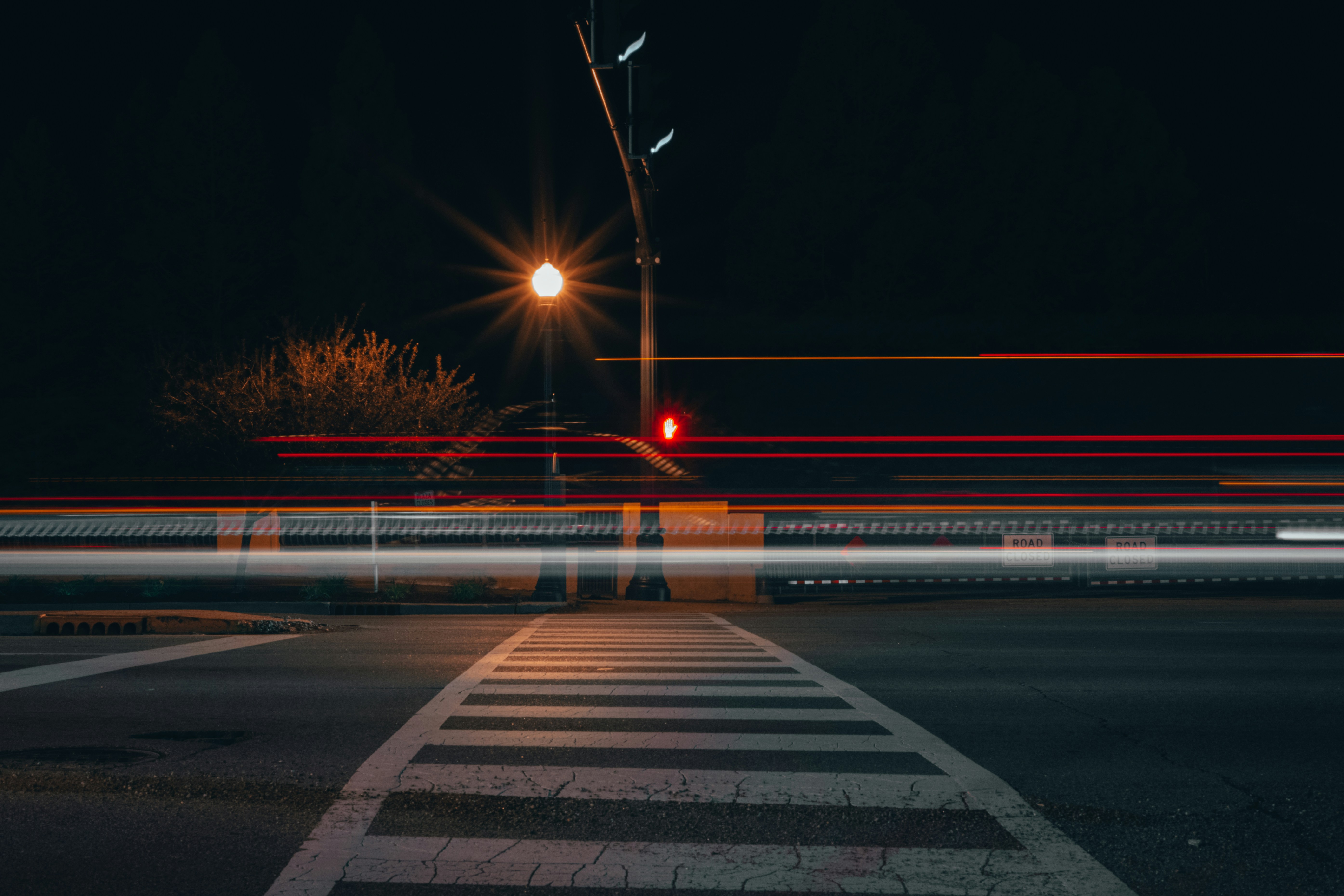 time lapse photography of cars on road during night time
