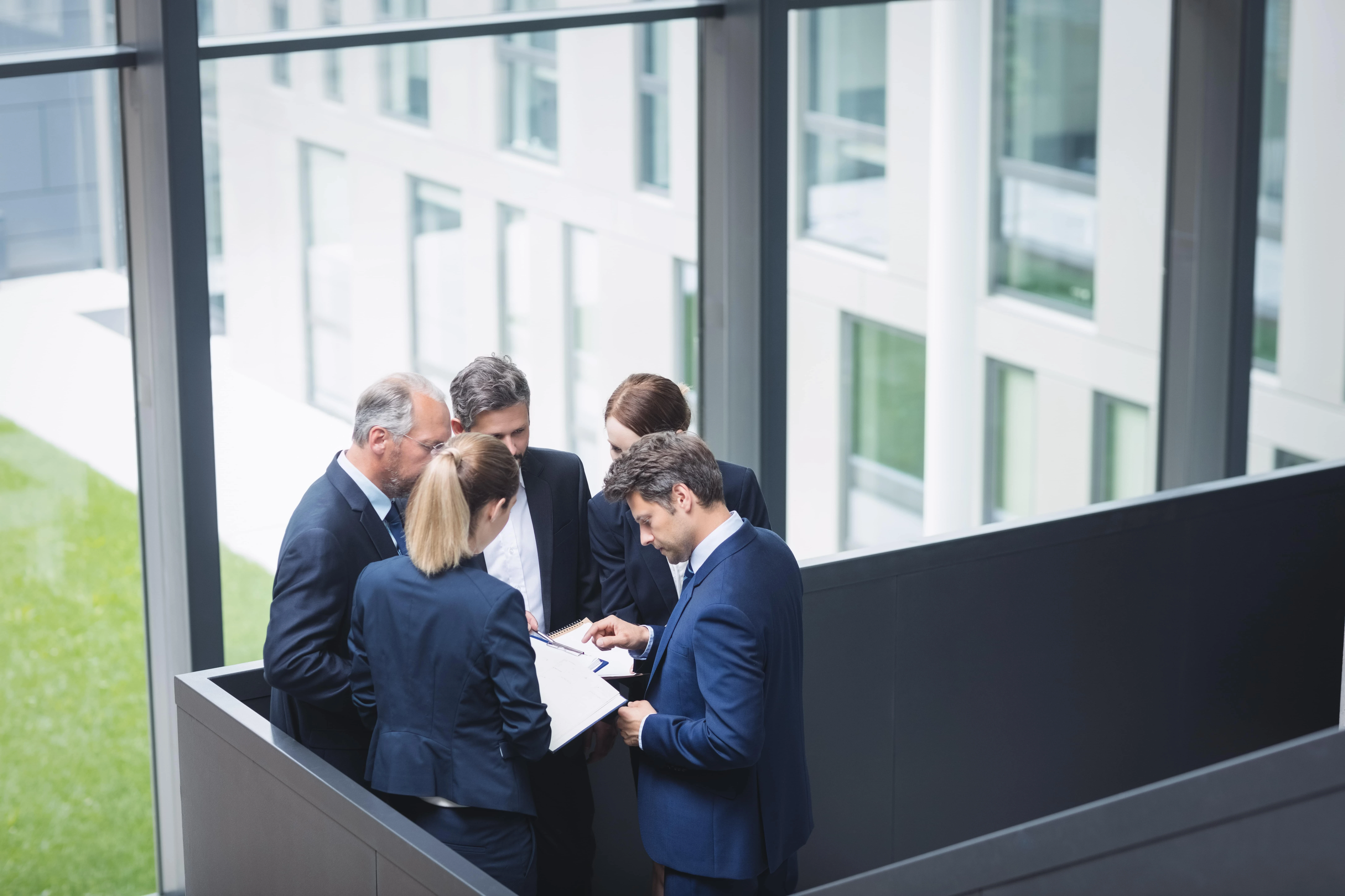 two women sitting on chair