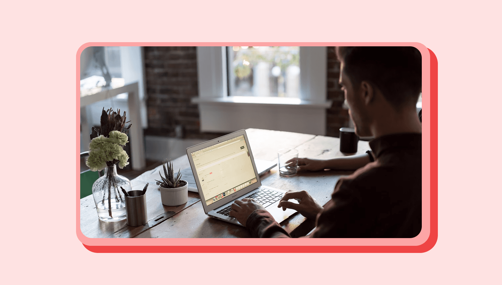 A man is working and studying using his laptop.