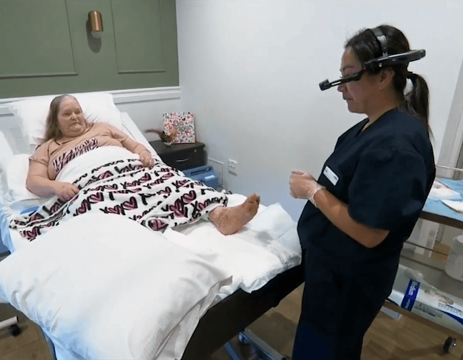 An image of a healthcare professional using a RealWear headset at work