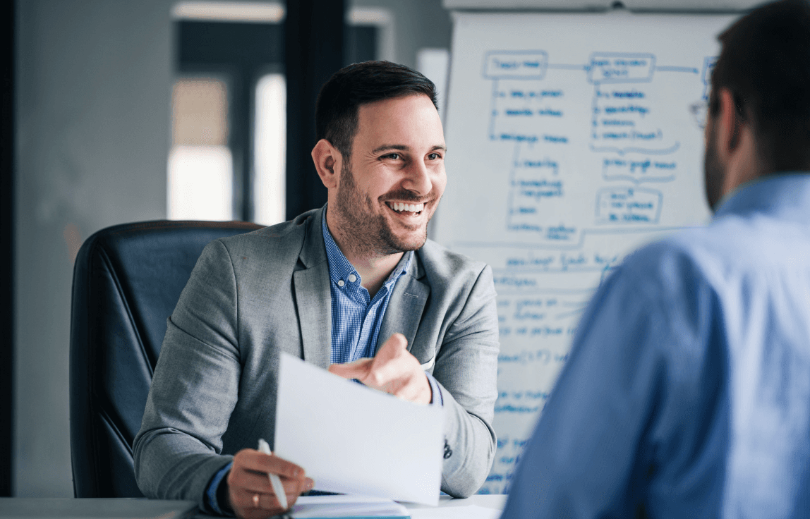 Two people discussing together in office