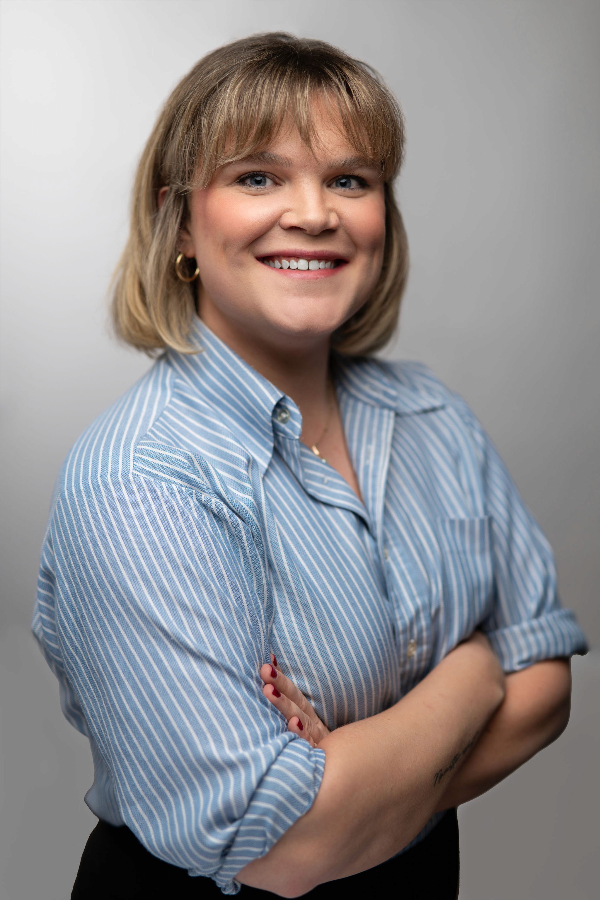 Woman poses for headshot