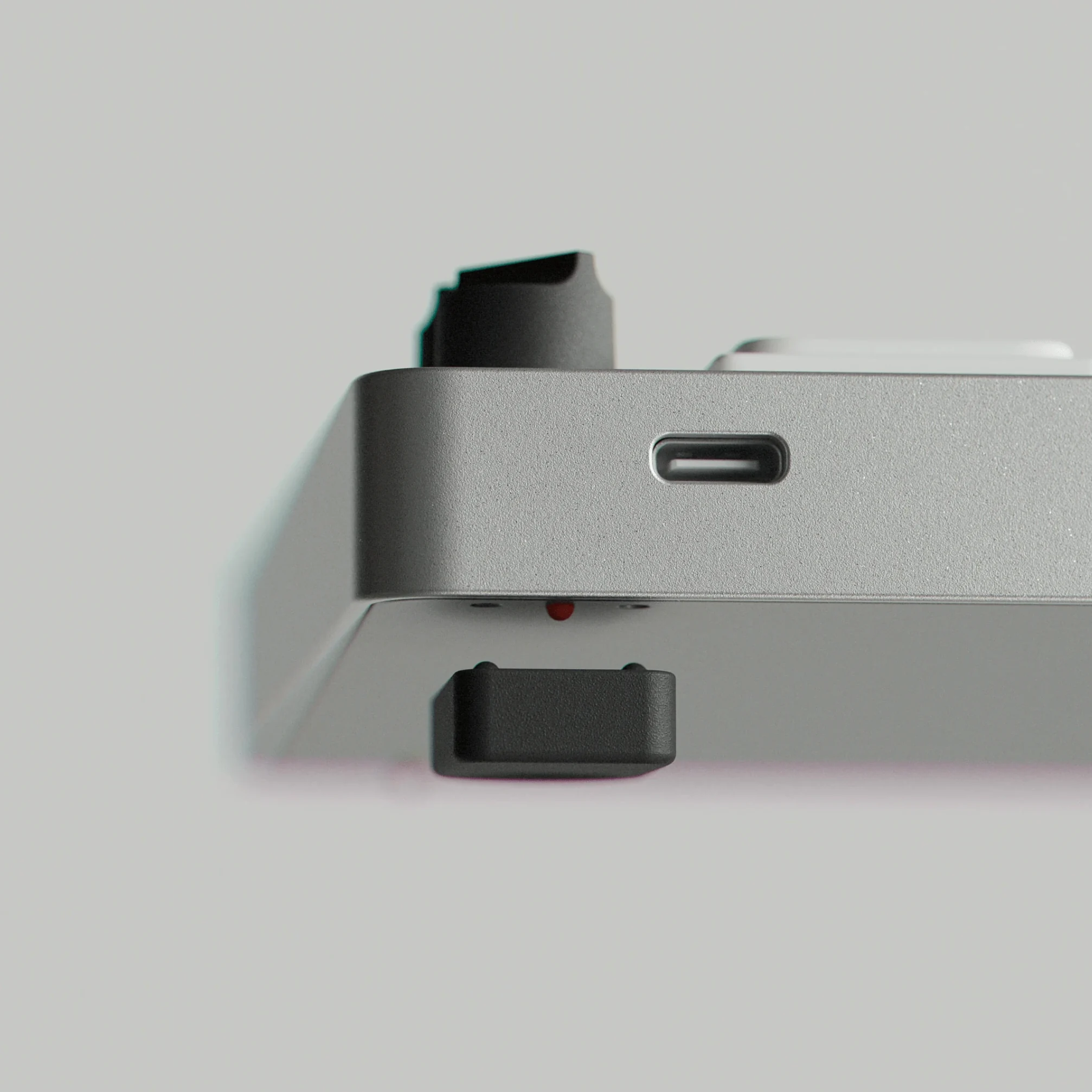 Close-up view of charging port on aluminum keyboard
