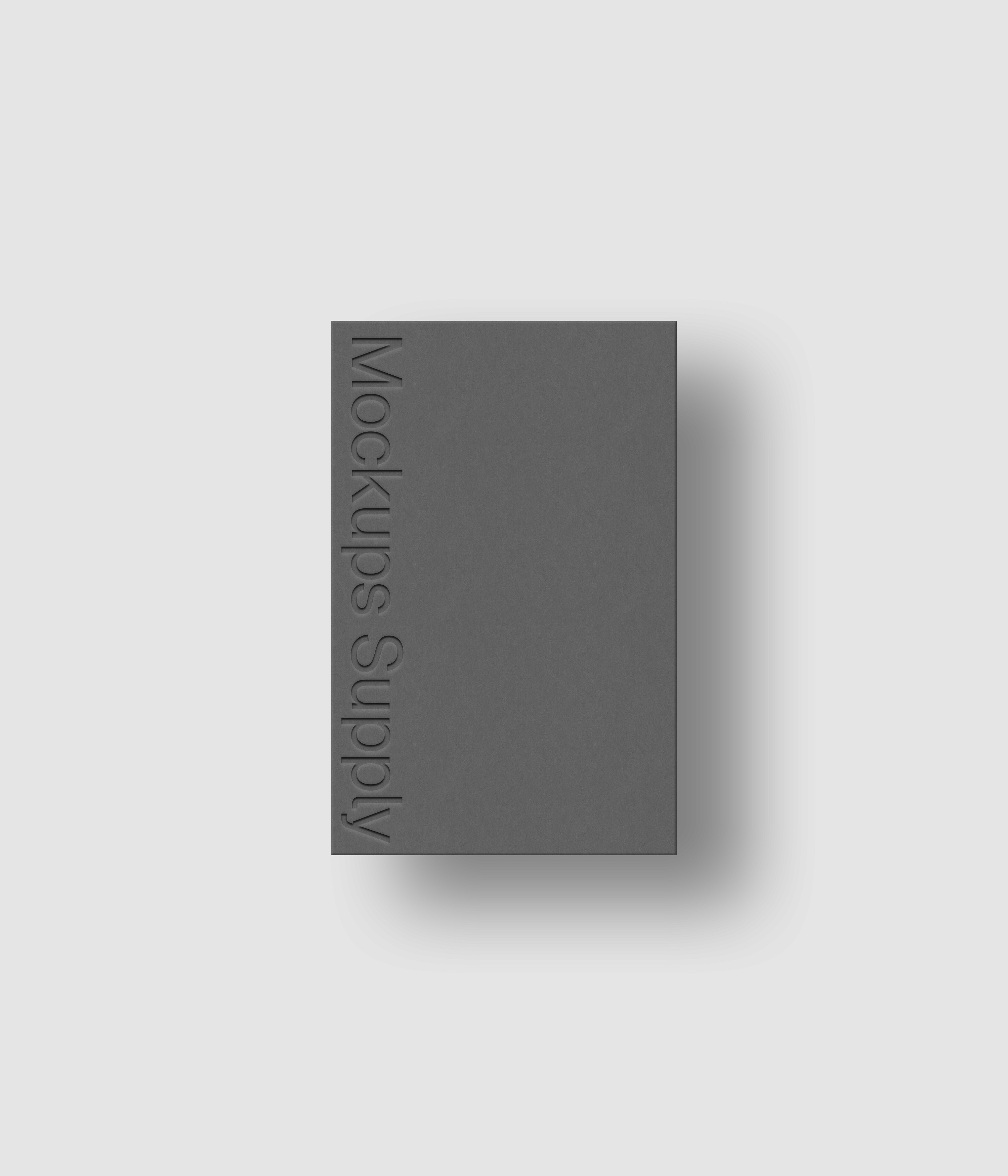 European business card mockup PSD portrait with debossed logo and soft shadow, gray card on white background, clean modern stationery mockup for brand identity