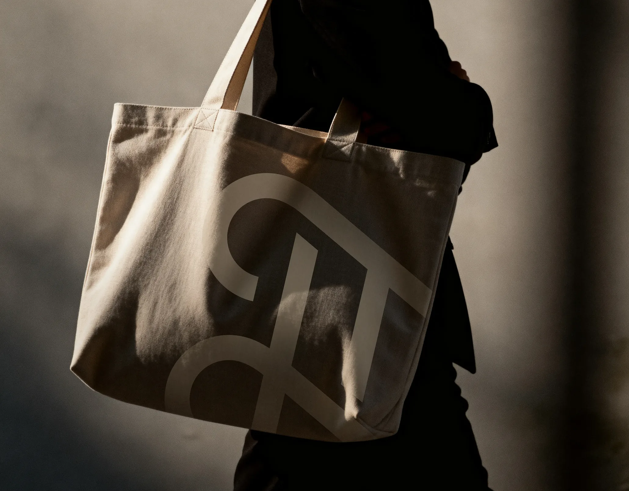 Canvas tote bag printed with the Thrive brand mark