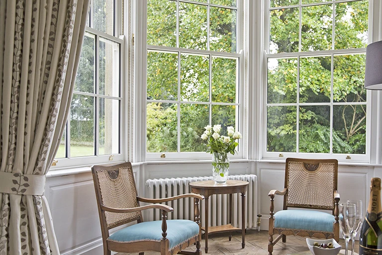 Hartingtons Heritage Tours hotel, Darley House, Sitting room withs in big window