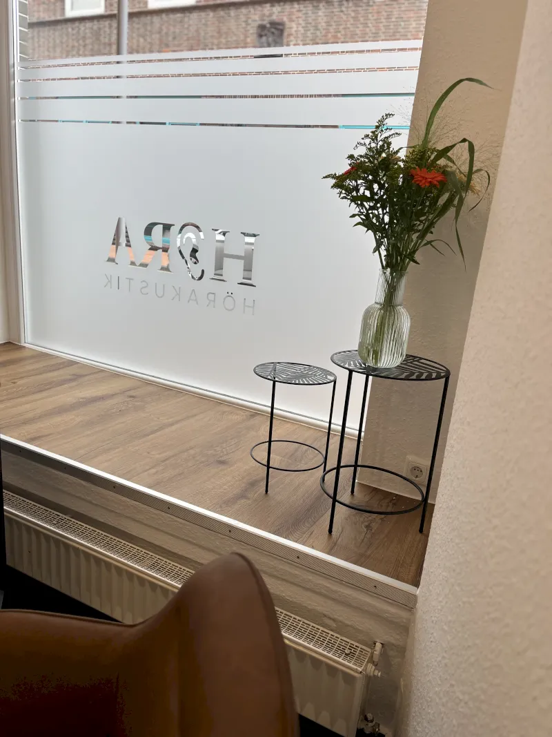 black flat screen tv on brown wooden table