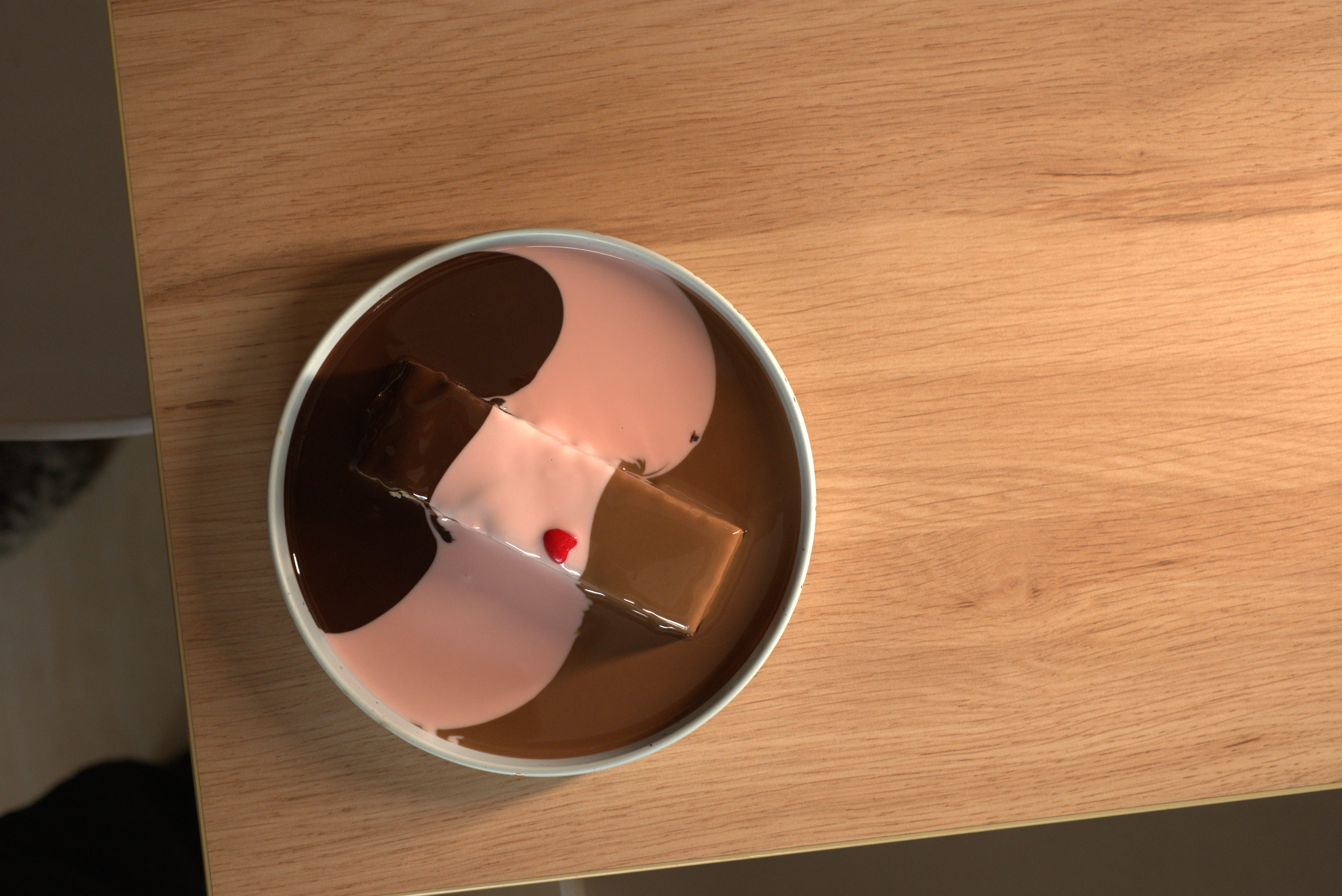 Two bright scoops of sorbet in a white bowl