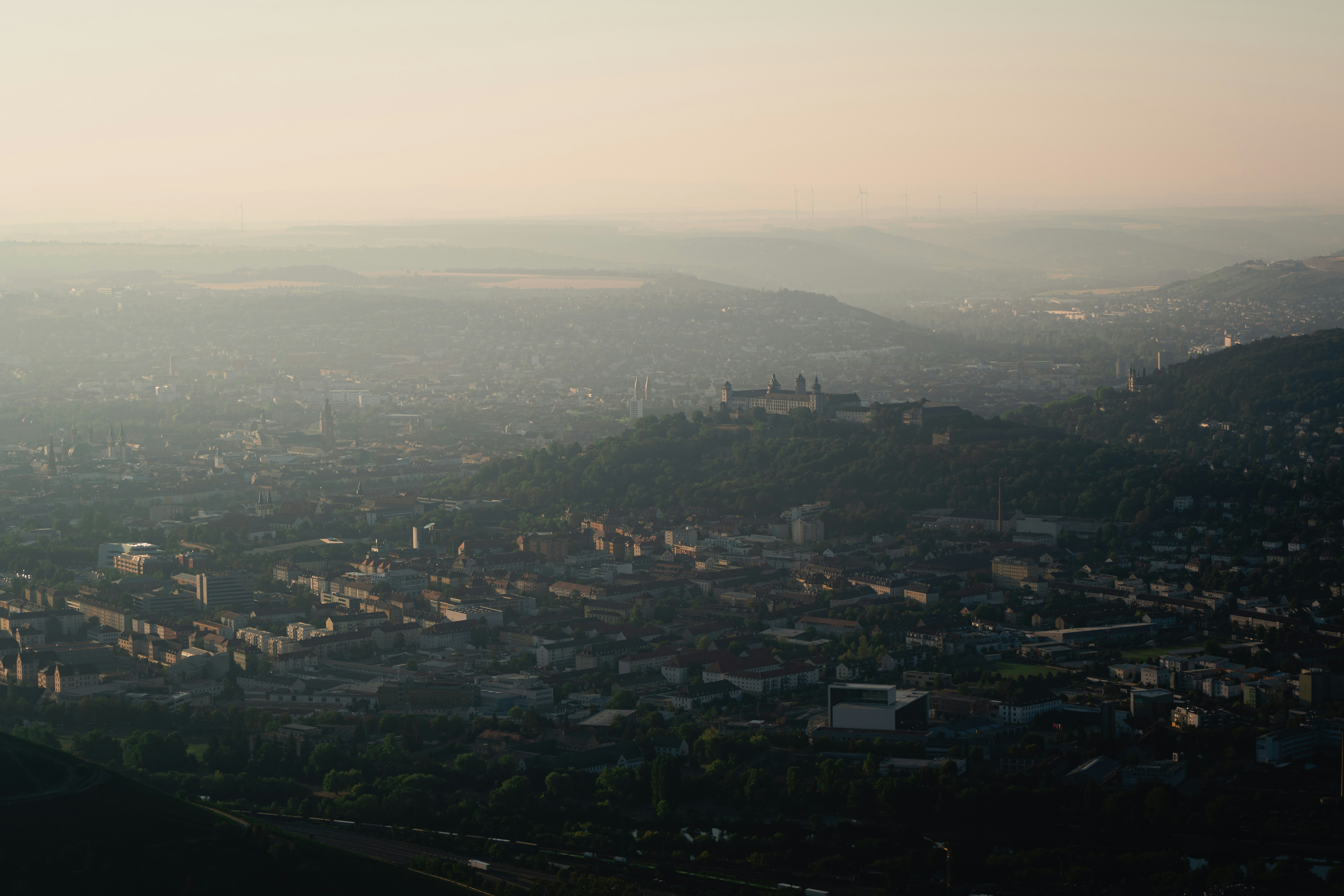 an aerial view of a city with a river running through it