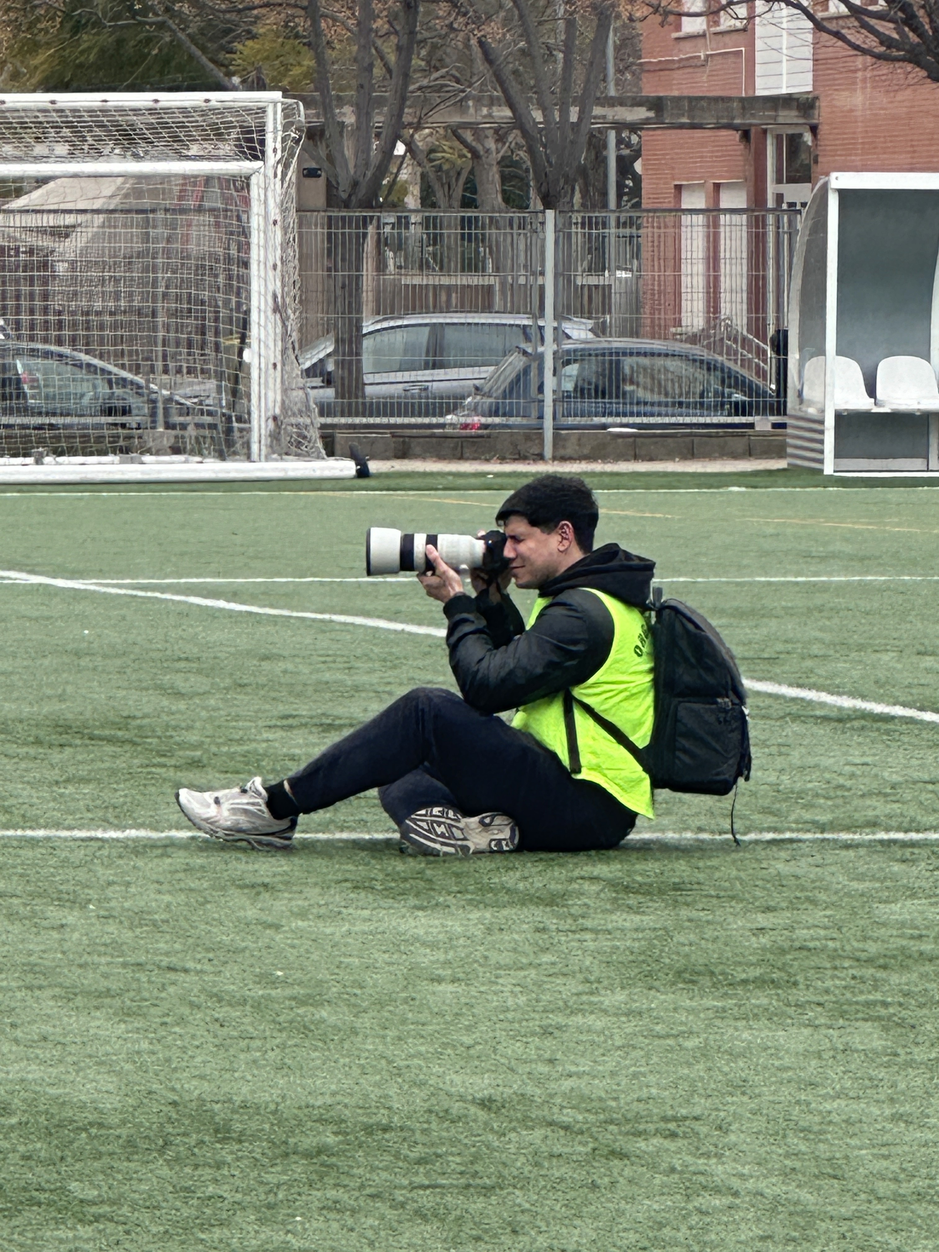 fotografo en capo de futbol