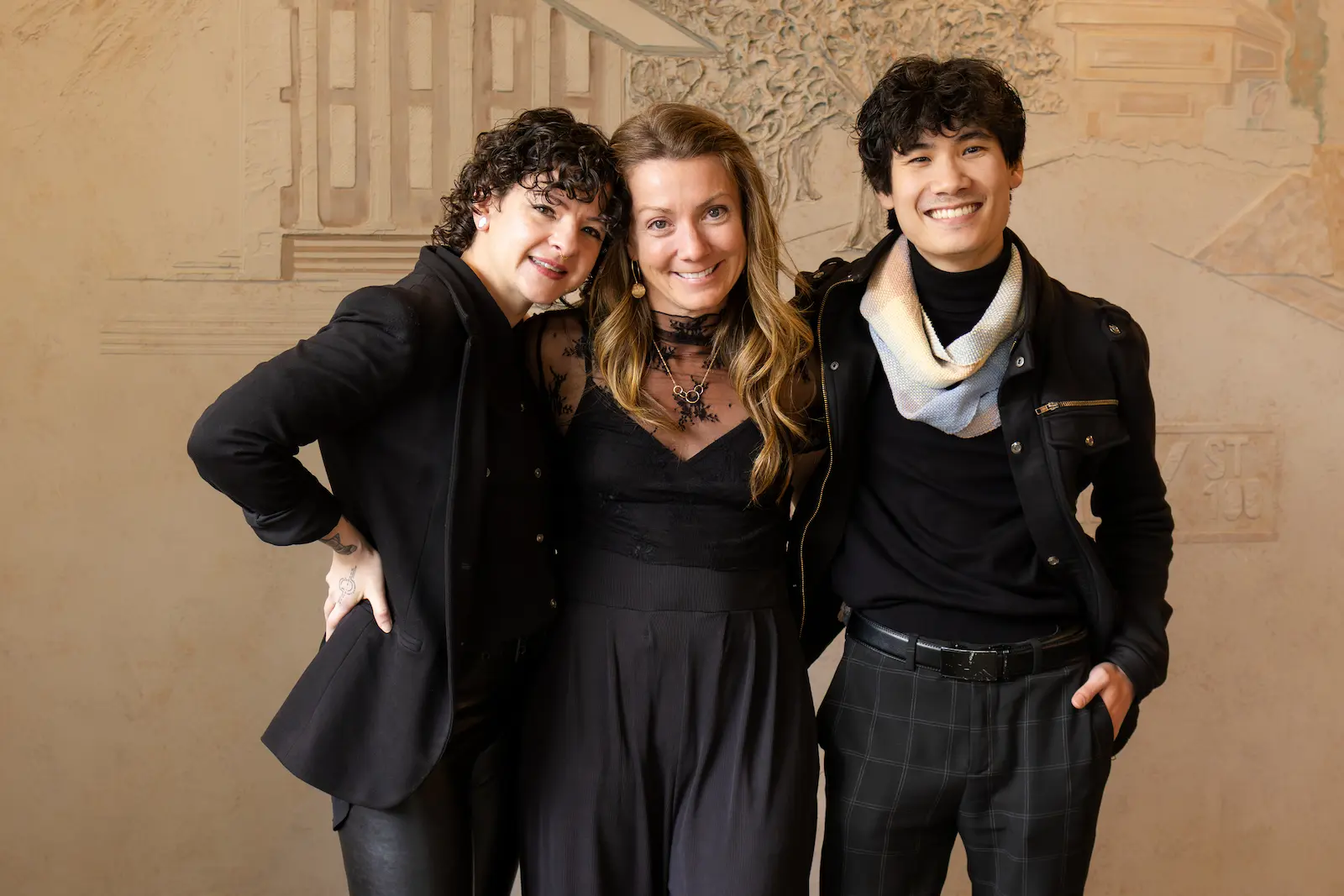 Bry, Jenny, and Chet with beige background.