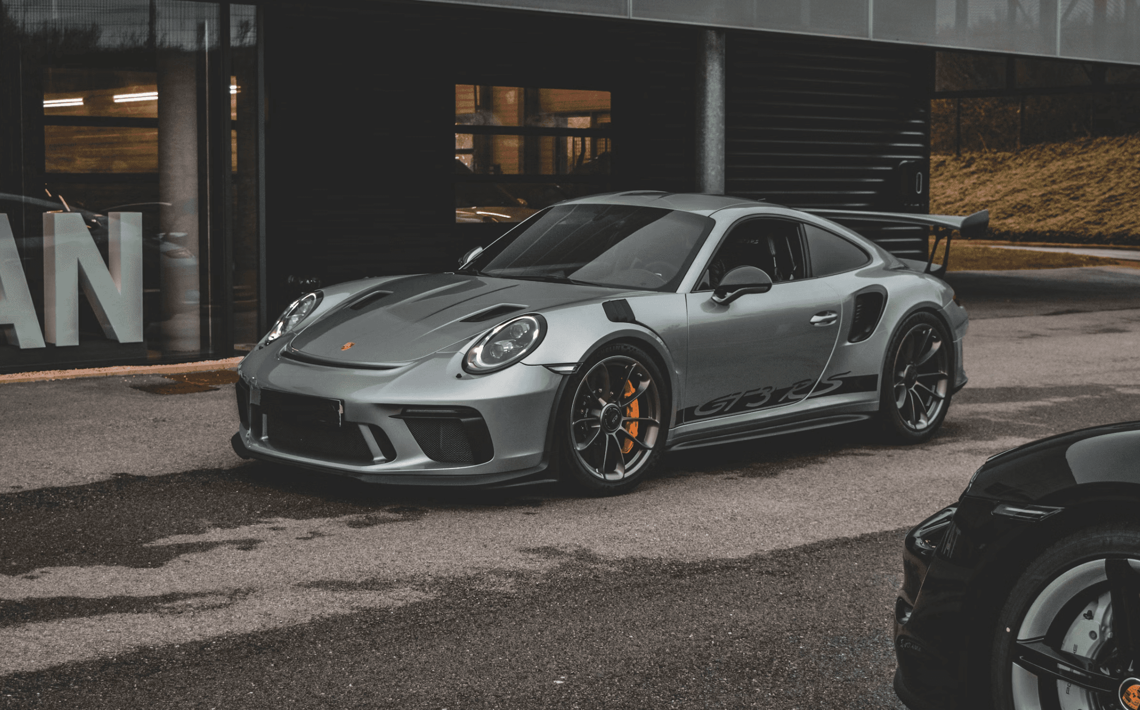 a man working on a roof with a power drill