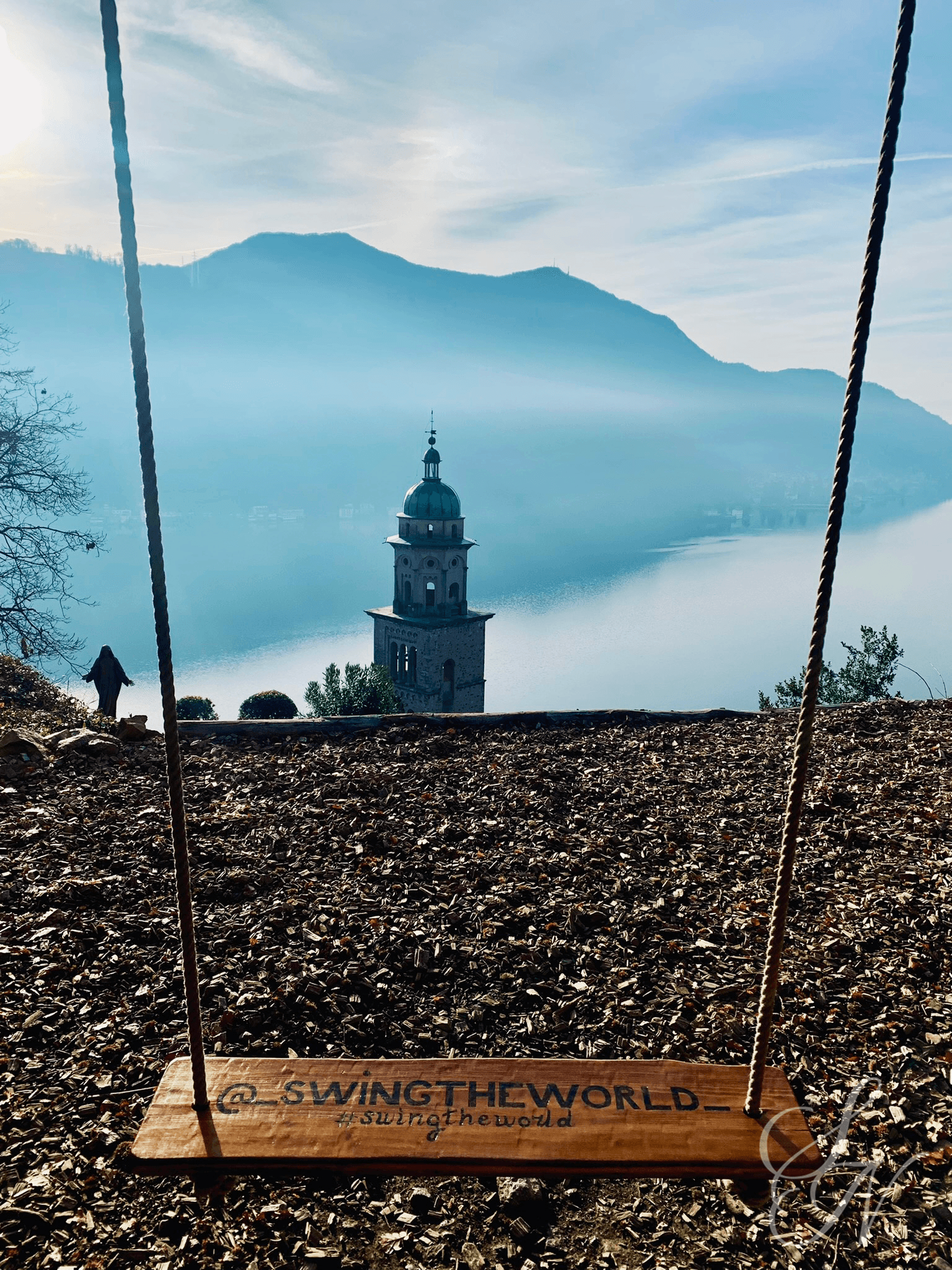 A 'Swing the World' swing located in Morcote, offering a panoramic view of the surrounding landscape.