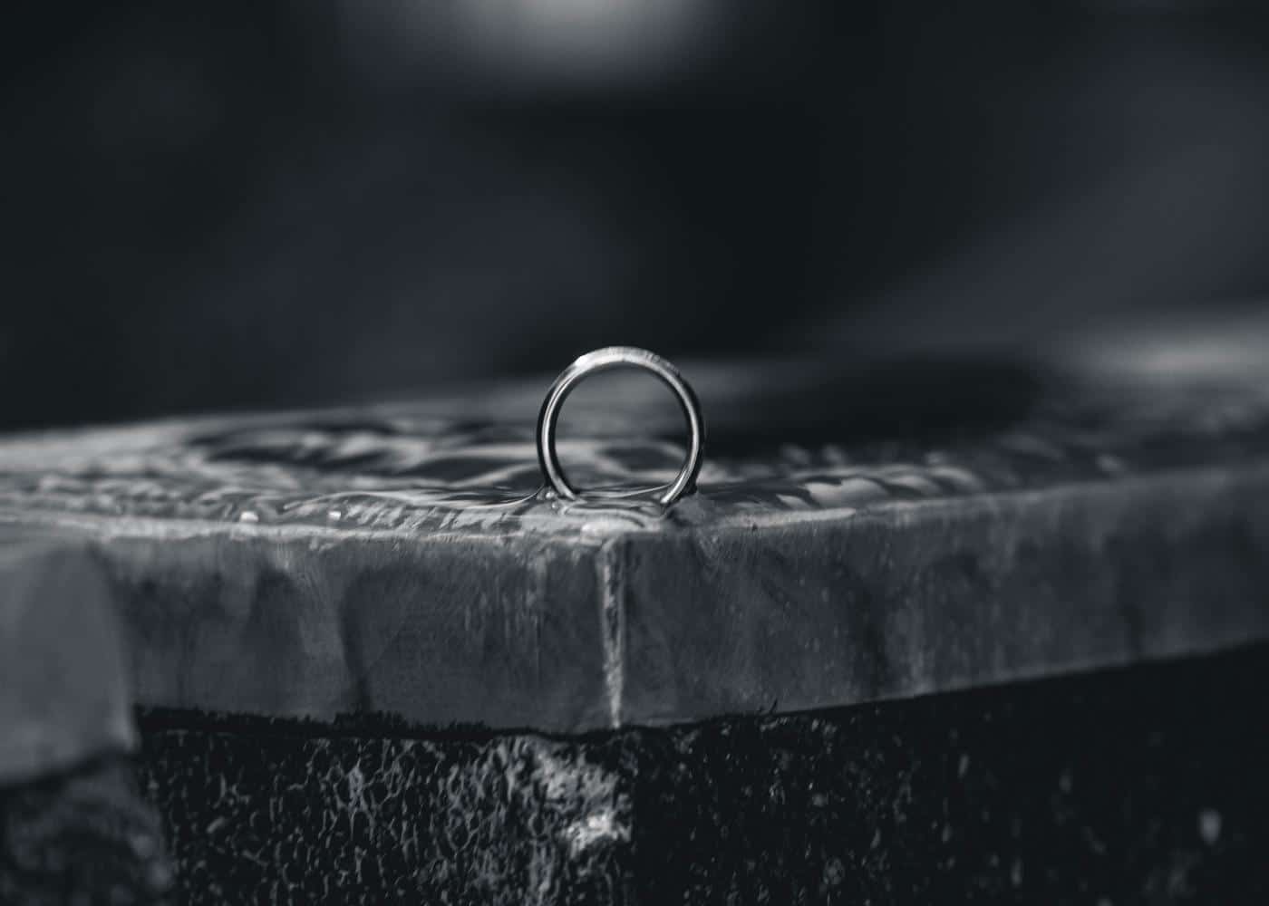 Silver swimming smart ring in water