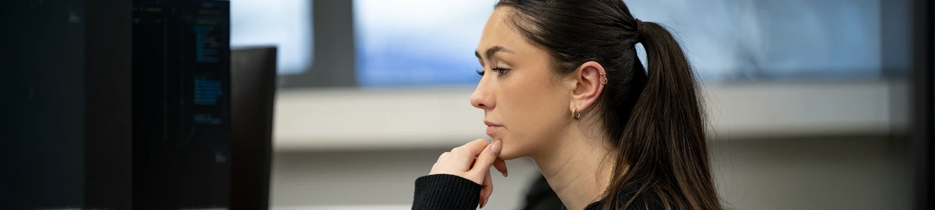A member of the izon team diligently working on a software solution