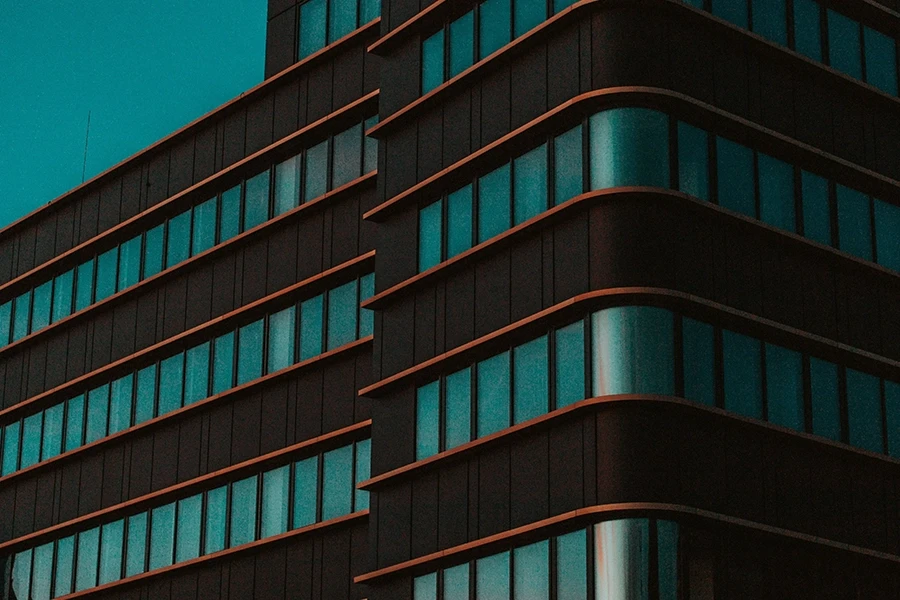 Building from the outside with lots of rows of windows.