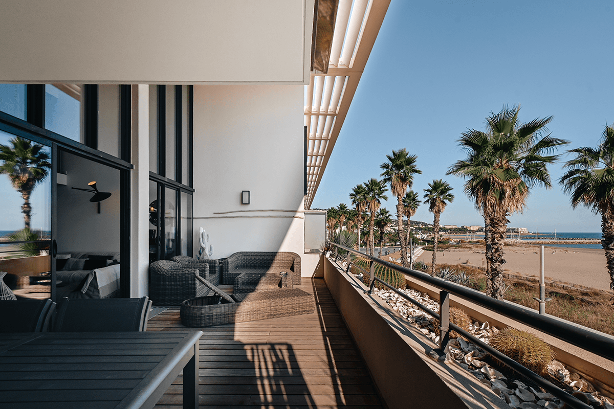 Streetside billboard with flyposters of the Batch.Works brand and illustrations