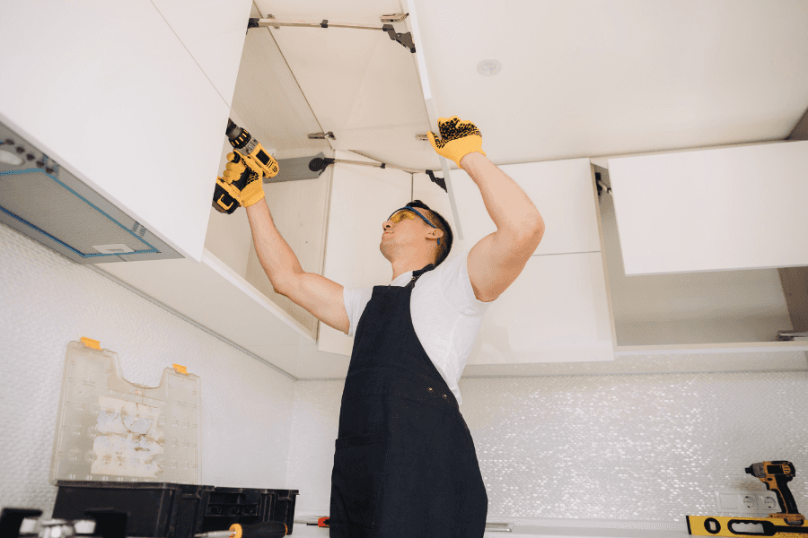 In-house maintenance team performing quick repairs in a rental unit.