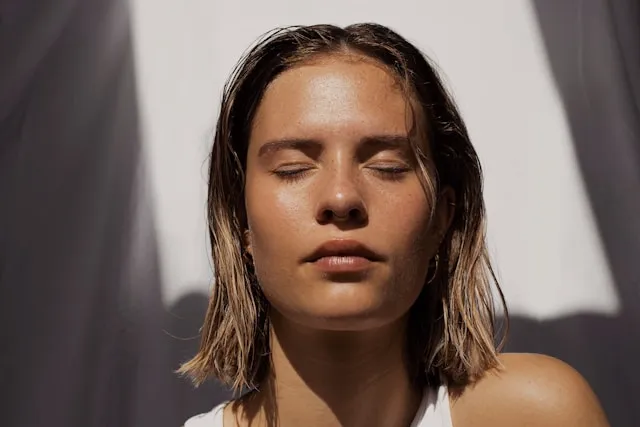 The portrait of woman with healthy skin