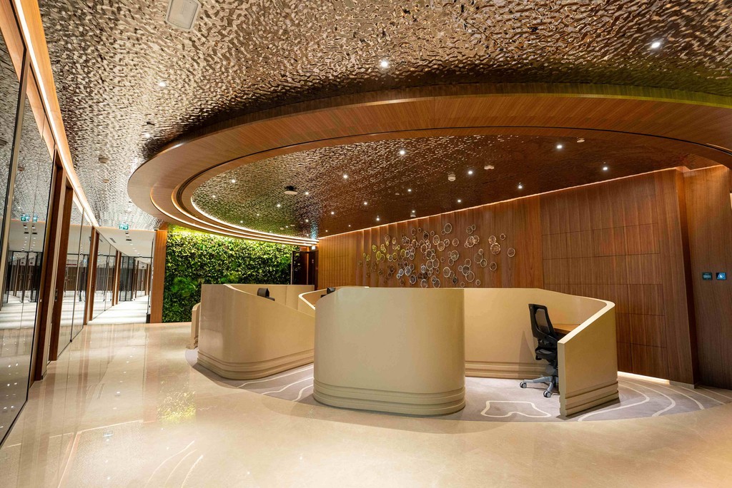 Professional using dedicated phone line and mail services from efficient virtual offices abu dhabi amenities. 