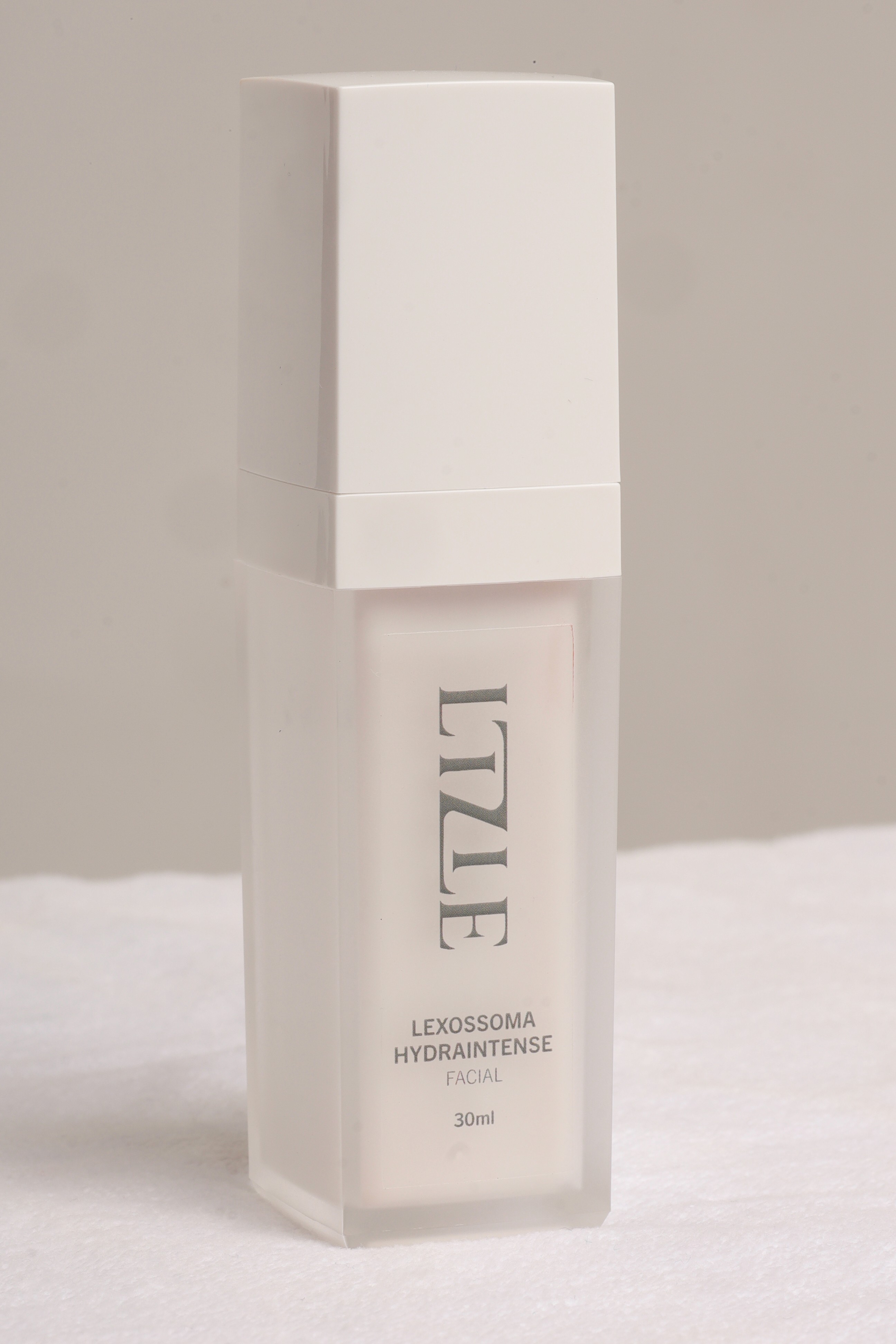 beige lotion bottle