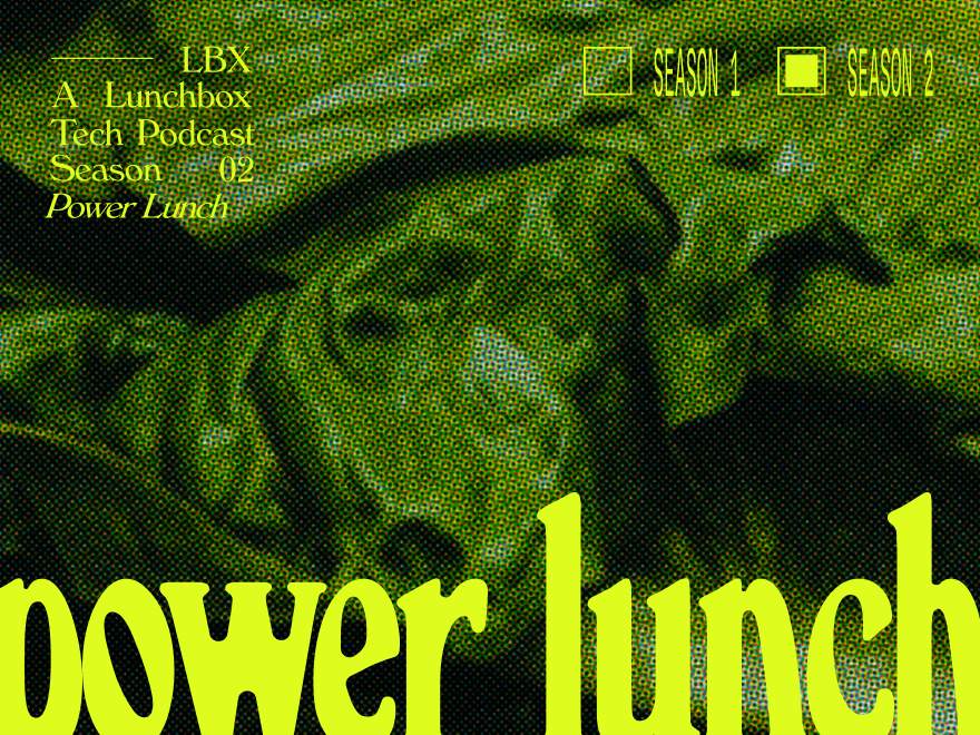 Green text displaying 'power lunch' with spinach as the background
